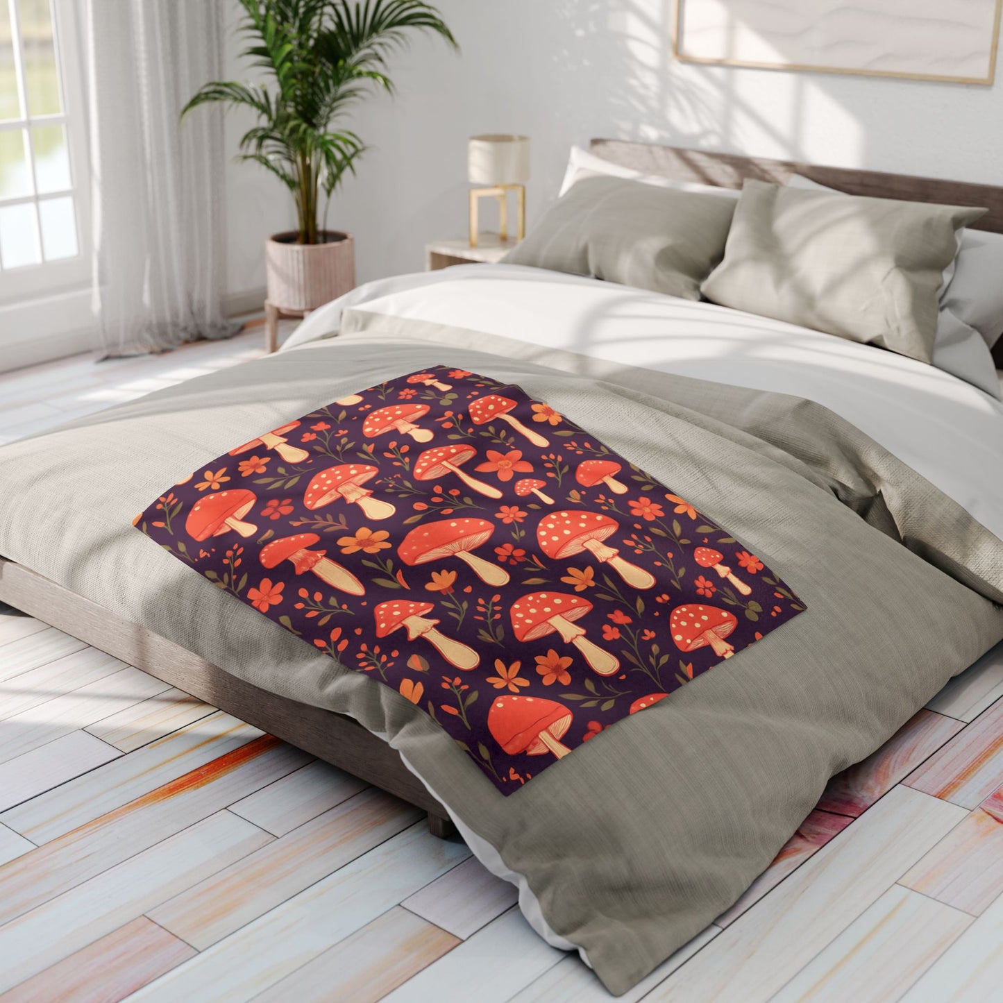 Cozy Mushroom Blanket, The enchanting mushroom pattern, set against a rich plum throw, turns any sofa into an autumnal paradise.