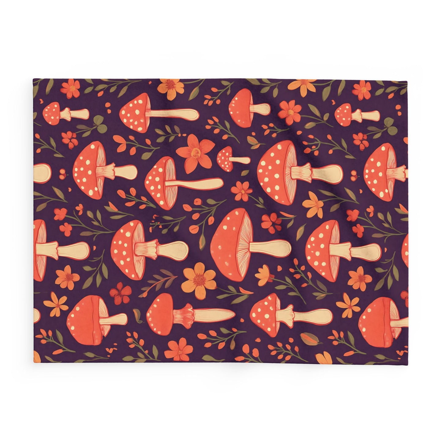 Cozy Mushroom Blanket, The enchanting mushroom pattern, set against a rich plum throw, turns any sofa into an autumnal paradise.