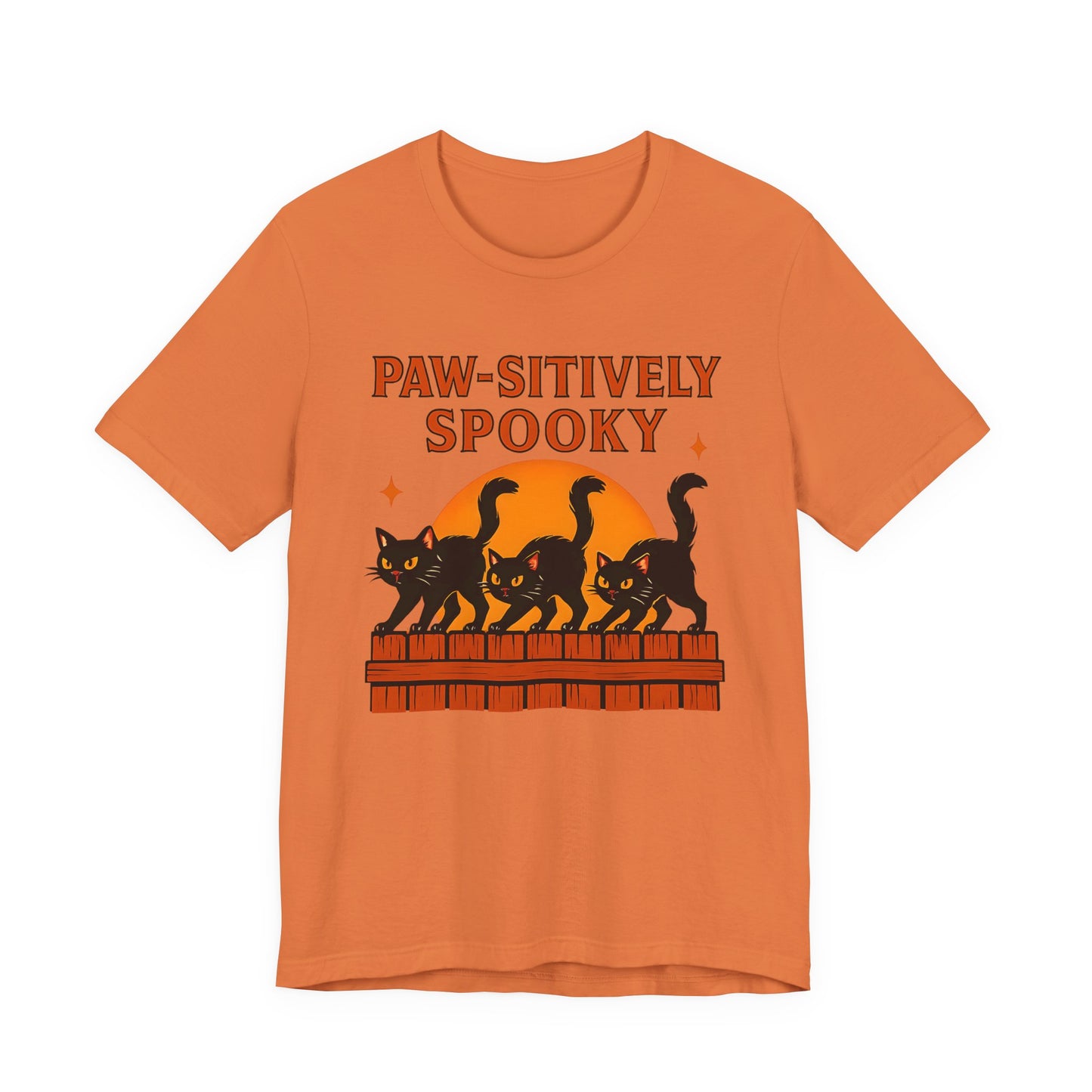 Paw-sitively Spooky Cat Tshirt, Whether you're a devoted cat dad or gifting it to a feline-loving friend, this cute Halloween cat apparel spreads pawsitive vibes with its blend of spooky black cats and cheeky charm.