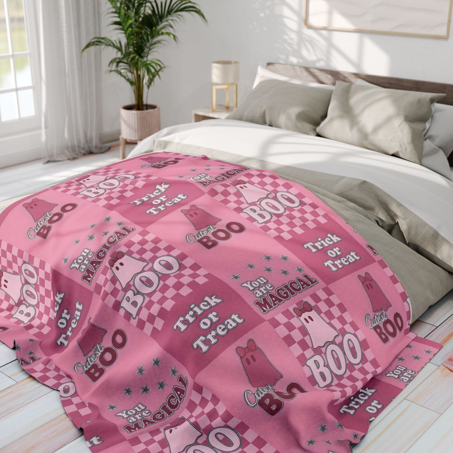 Cutest Boo Pink Ghost Blanket, This soft and fluffy throw features charming ghosties dancing across a playful pink canvas, making it the perfect snuggle blanket for cozy nights in.