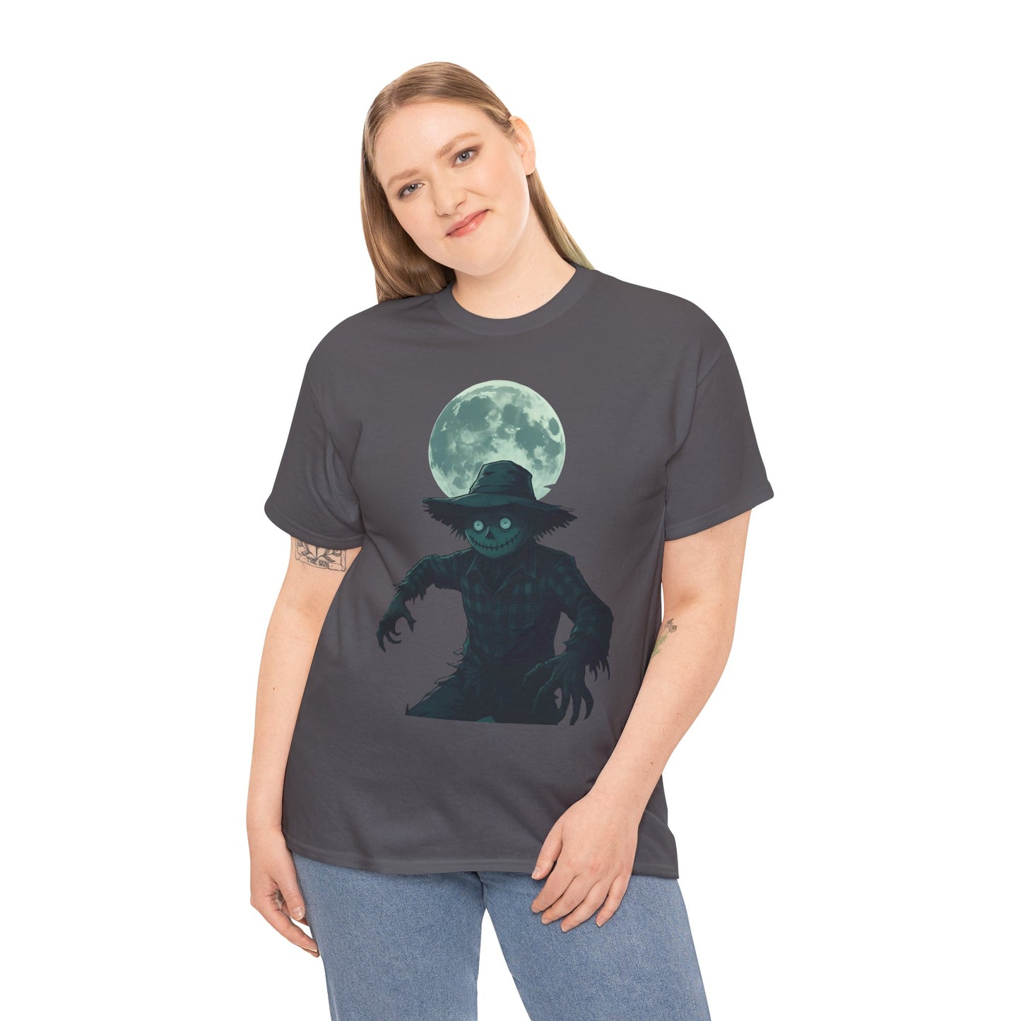 Halloween Scarecrow T-Shirt, This scarecrow shirt captures the essence of the season, transforming the traditional harvest icon into a pumpkin scarecrow that’s both captivating and chilling.Halloween