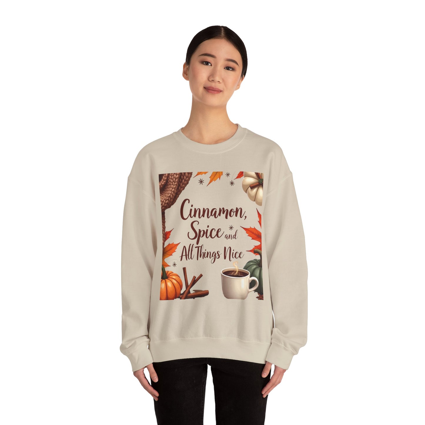 Cinnamon Spice and All Things Nice Sweatshirt, promises to keep you snug while adding a touch of seasonal charm to your wardrobe. Whether you’re sipping on a pumpkin latte or taking a leisurely stroll through fallen leaves,
