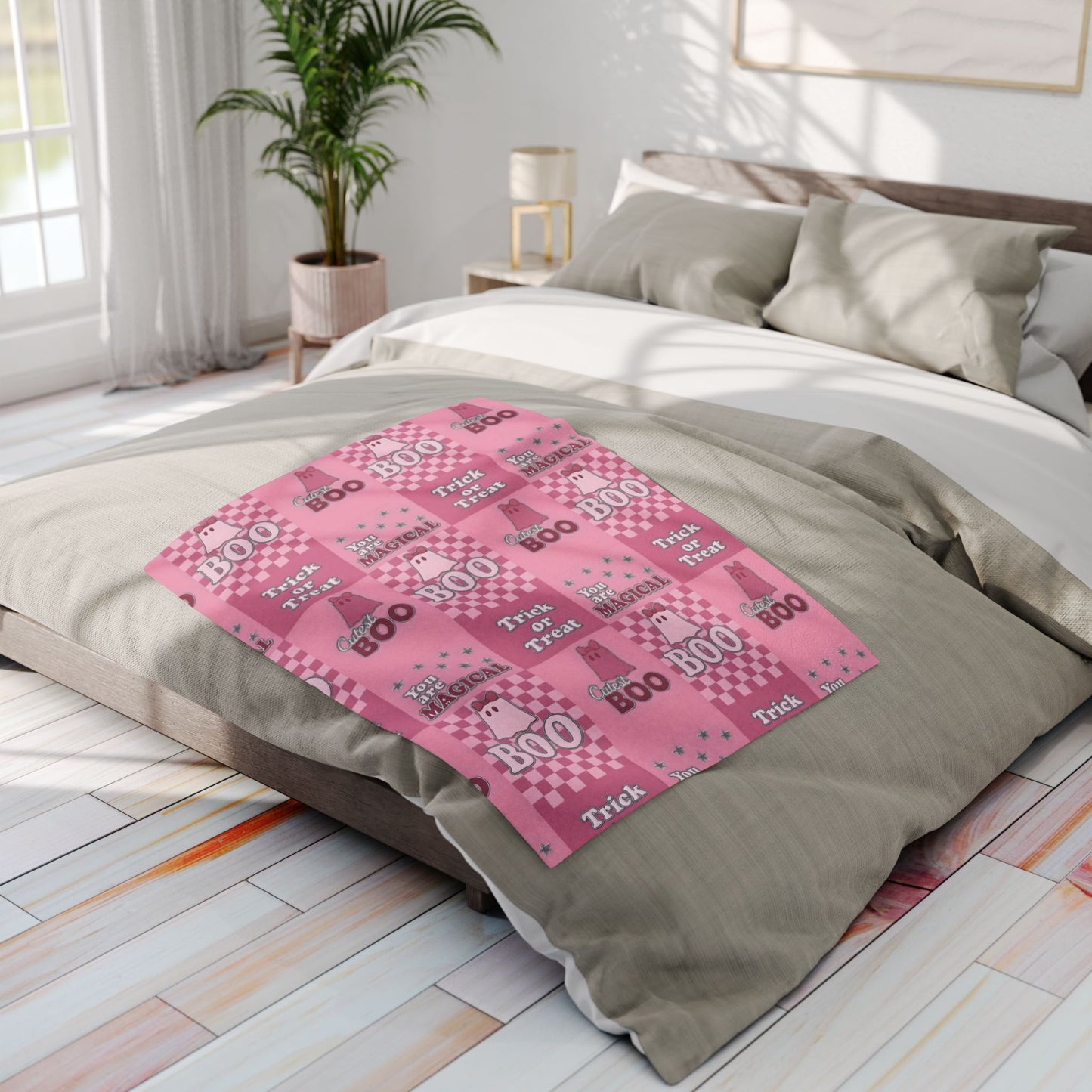 Cutest Boo Pink Ghost Blanket, This soft and fluffy throw features charming ghosties dancing across a playful pink canvas, making it the perfect snuggle blanket for cozy nights in.