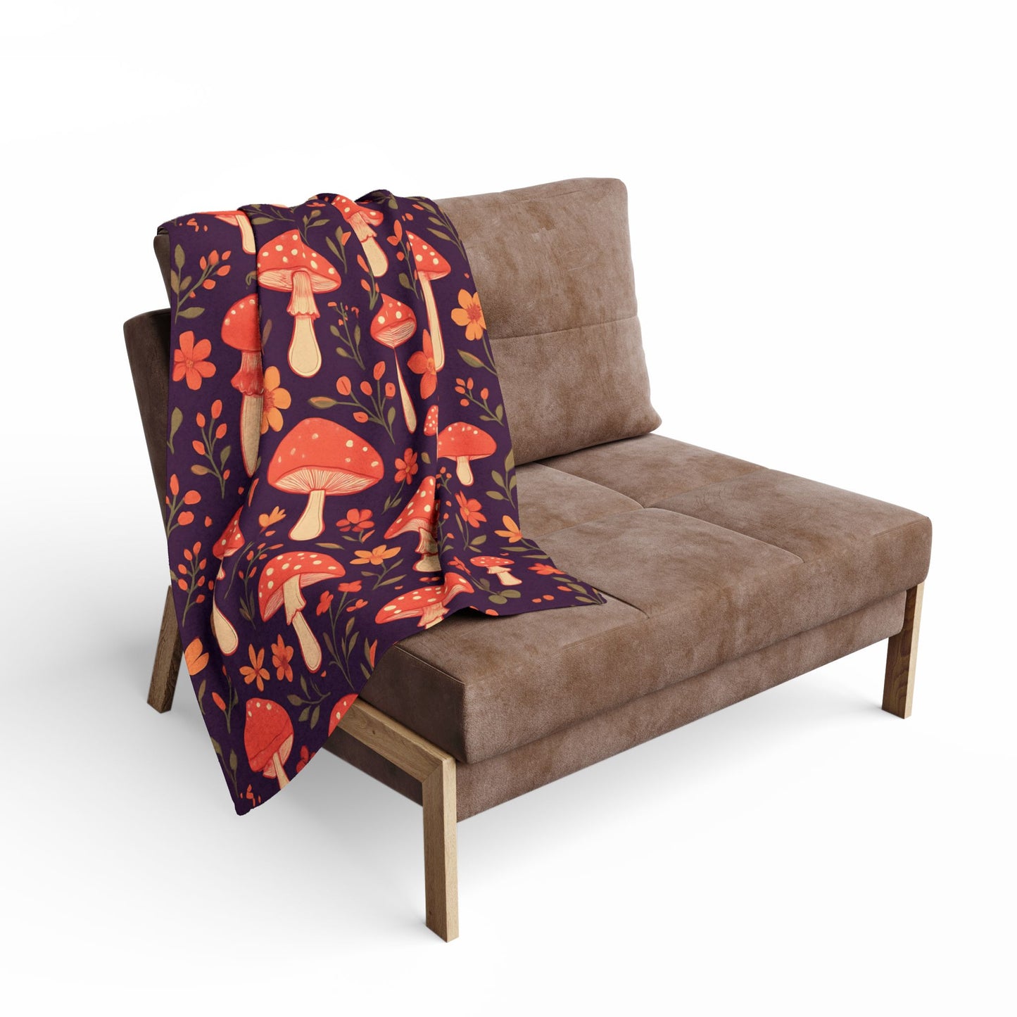 Cozy Mushroom Blanket, The enchanting mushroom pattern, set against a rich plum throw, turns any sofa into an autumnal paradise.