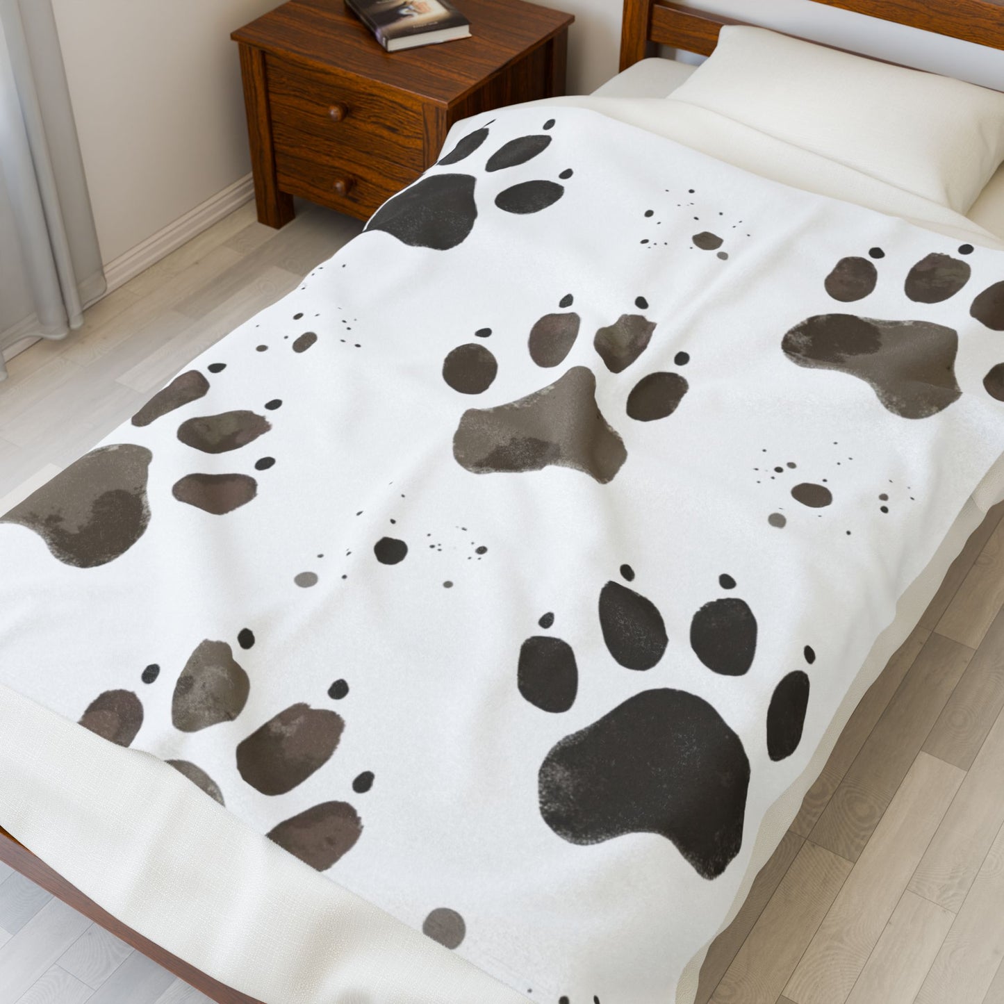 Plush Pet Paw Blanket, perfect for cozy nights in or lazy afternoons on the sofa. The vibrant print adds a playful touch to any room, making it an ideal addition to your home decor.