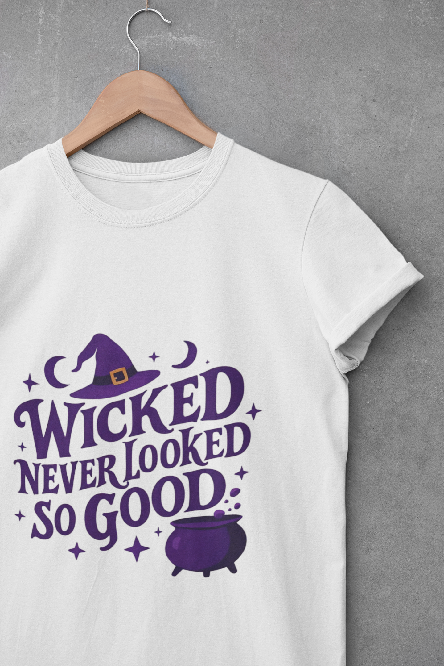 Wicked Never Looked So Good T-Shirt, a spellbinding addition to any witchy wardrobe, embodying the mischievous charm of witchcraft.