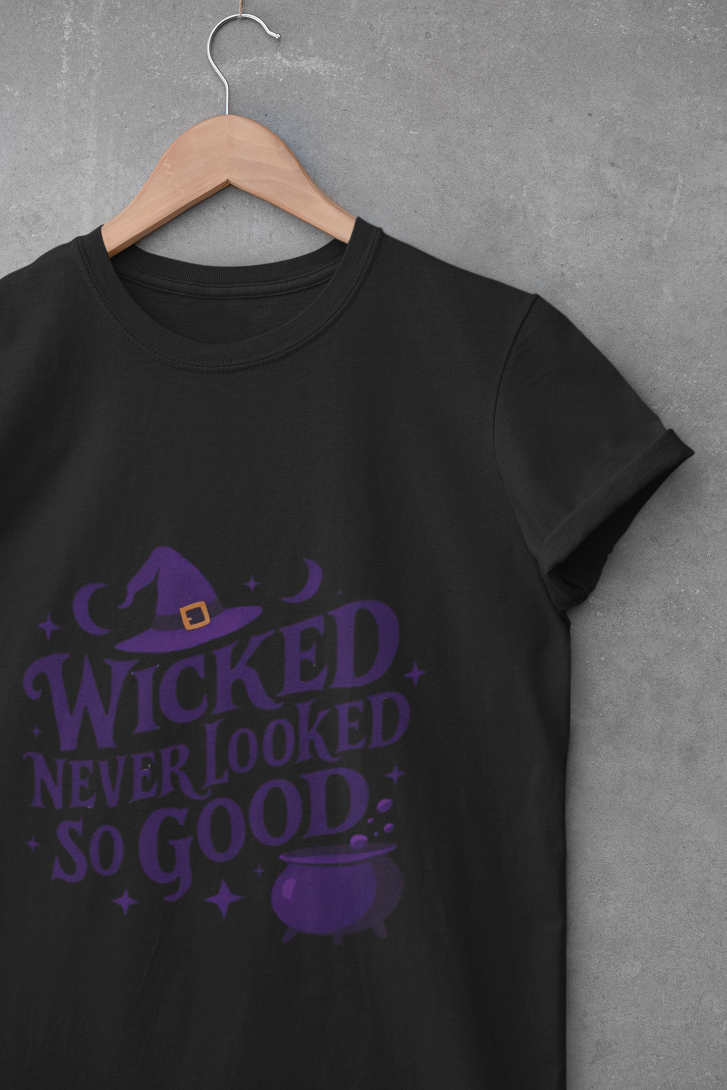 Wicked Never Looked So Good T-Shirt, a spellbinding addition to any witchy wardrobe, embodying the mischievous charm of witchcraft.