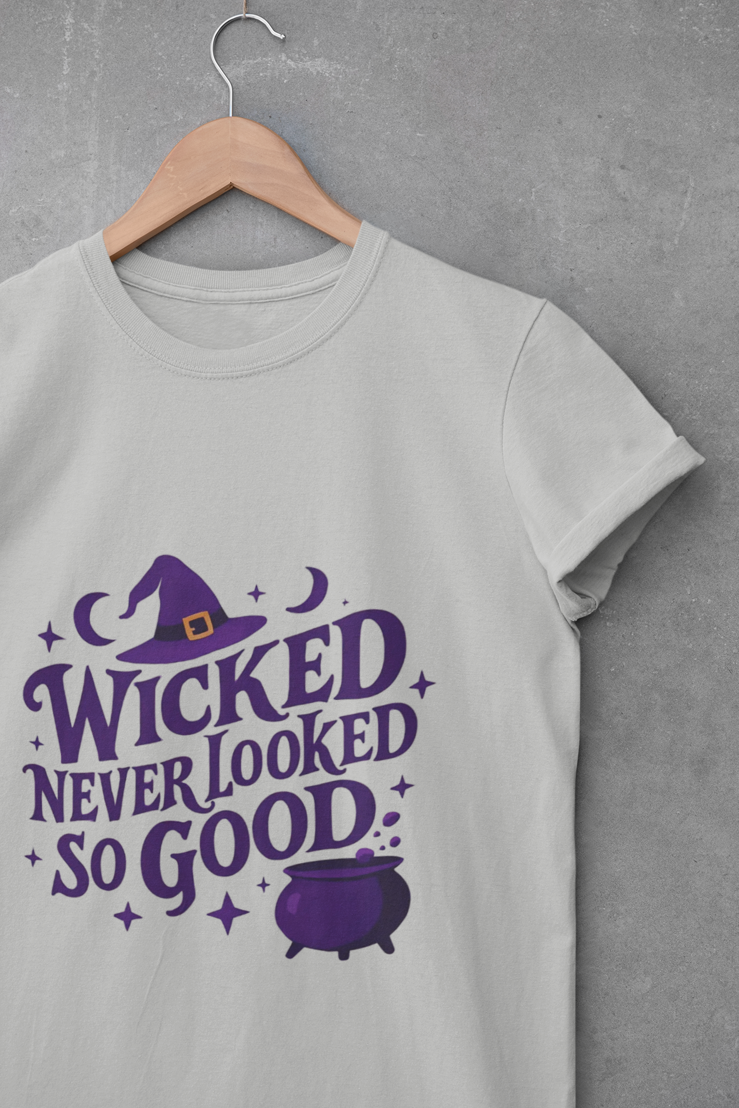 Wicked Never Looked So Good T-Shirt, a spellbinding addition to any witchy wardrobe, embodying the mischievous charm of witchcraft.