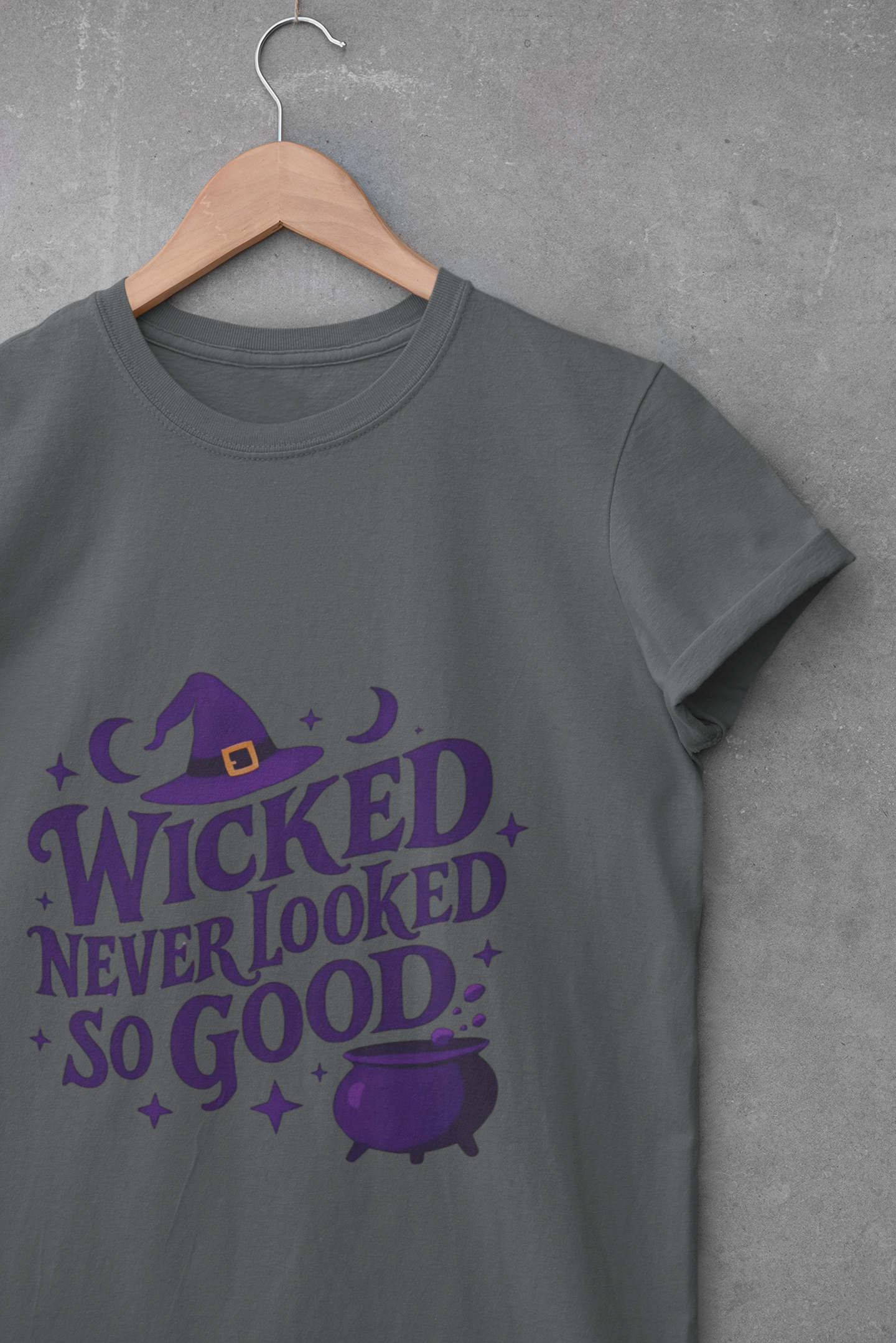 Wicked Never Looked So Good T-Shirt, a spellbinding addition to any witchy wardrobe, embodying the mischievous charm of witchcraft.