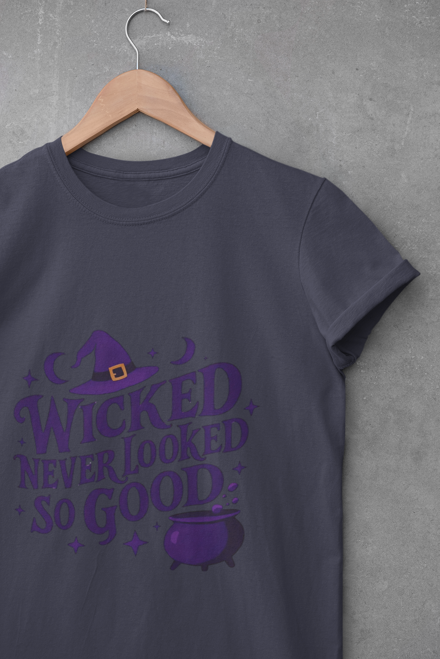 Wicked Never Looked So Good T-Shirt, a spellbinding addition to any witchy wardrobe, embodying the mischievous charm of witchcraft.