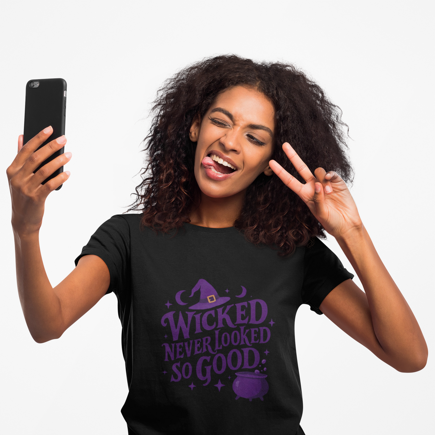 Wicked Never Looked So Good T-Shirt, a spellbinding addition to any witchy wardrobe, embodying the mischievous charm of witchcraft.
