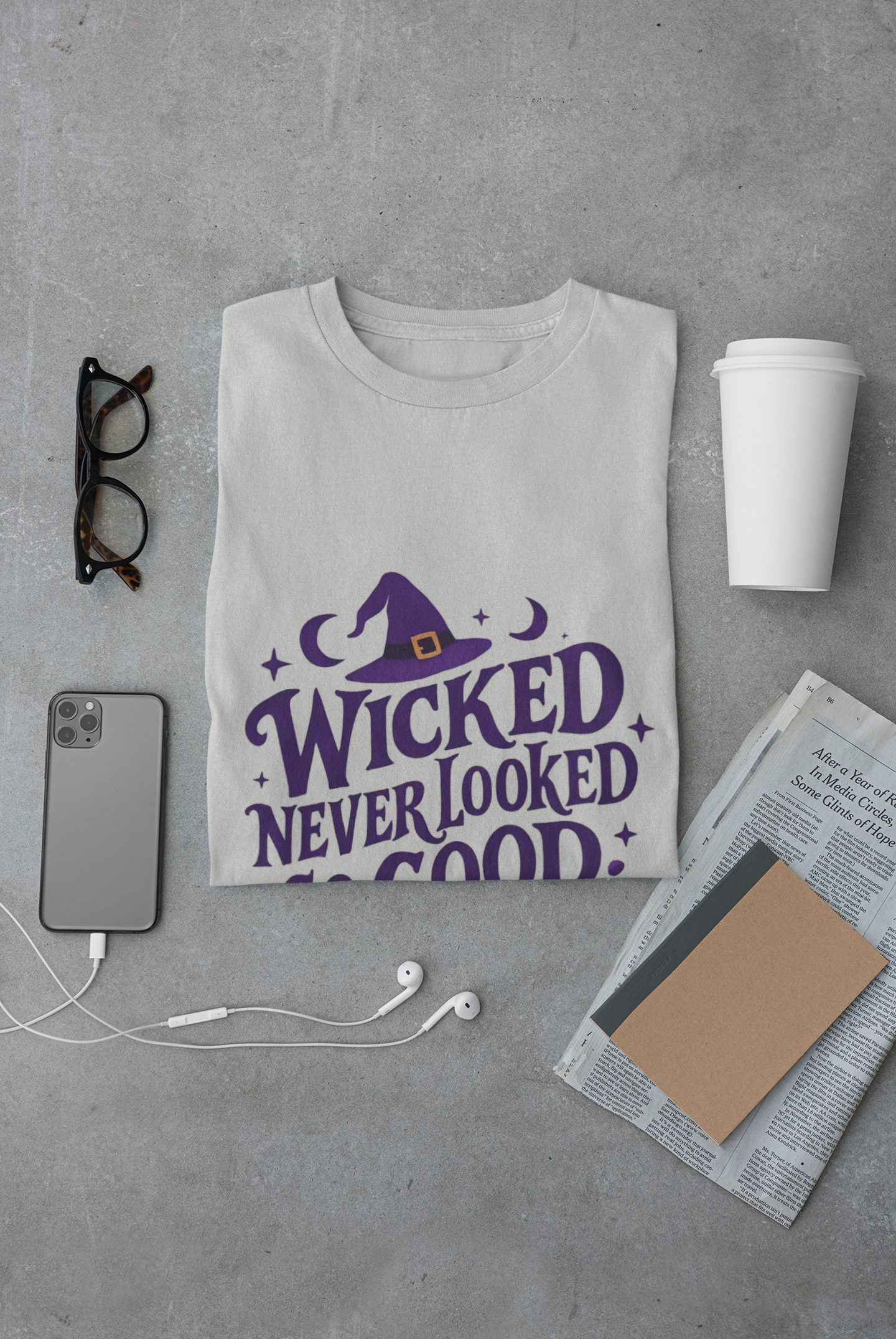Wicked Never Looked So Good T-Shirt, a spellbinding addition to any witchy wardrobe, embodying the mischievous charm of witchcraft.
