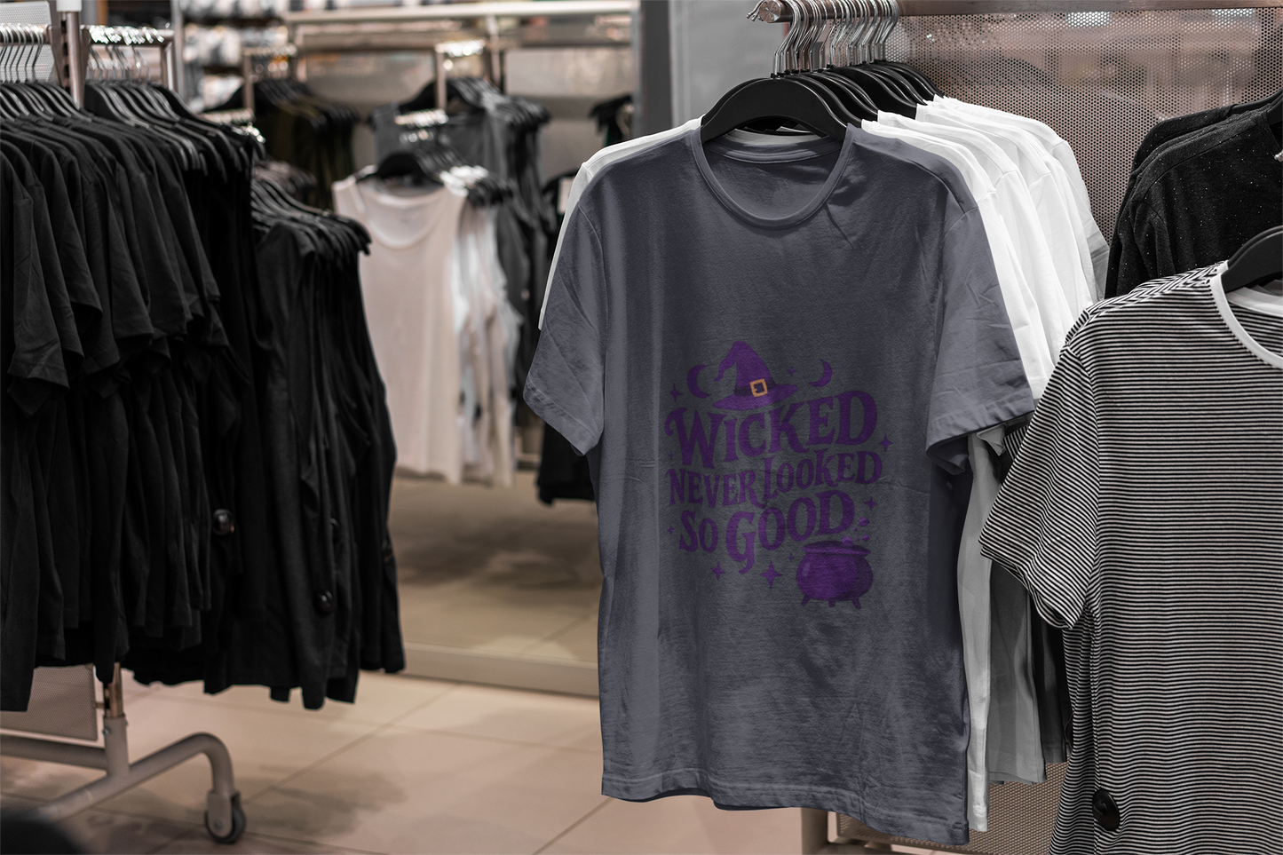 Wicked Never Looked So Good T-Shirt, a spellbinding addition to any witchy wardrobe, embodying the mischievous charm of witchcraft.