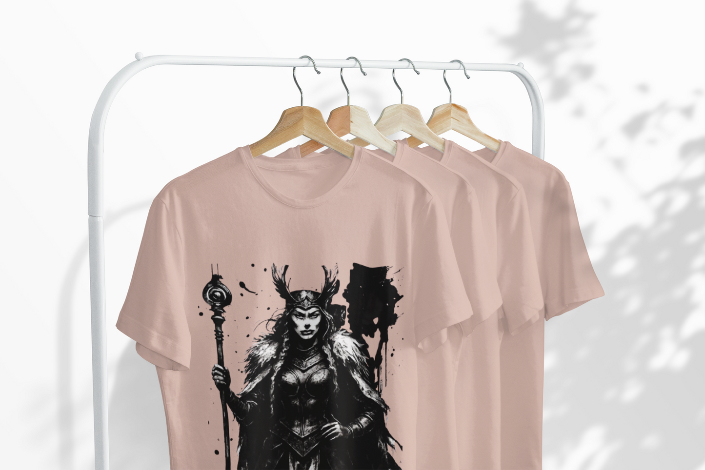 Frigg Norse Goddess T-shirt, captures the essence of Frigg, the revered Norse goddess, renowned in Nordic mythology as the embodiment of foresight and wisdom.