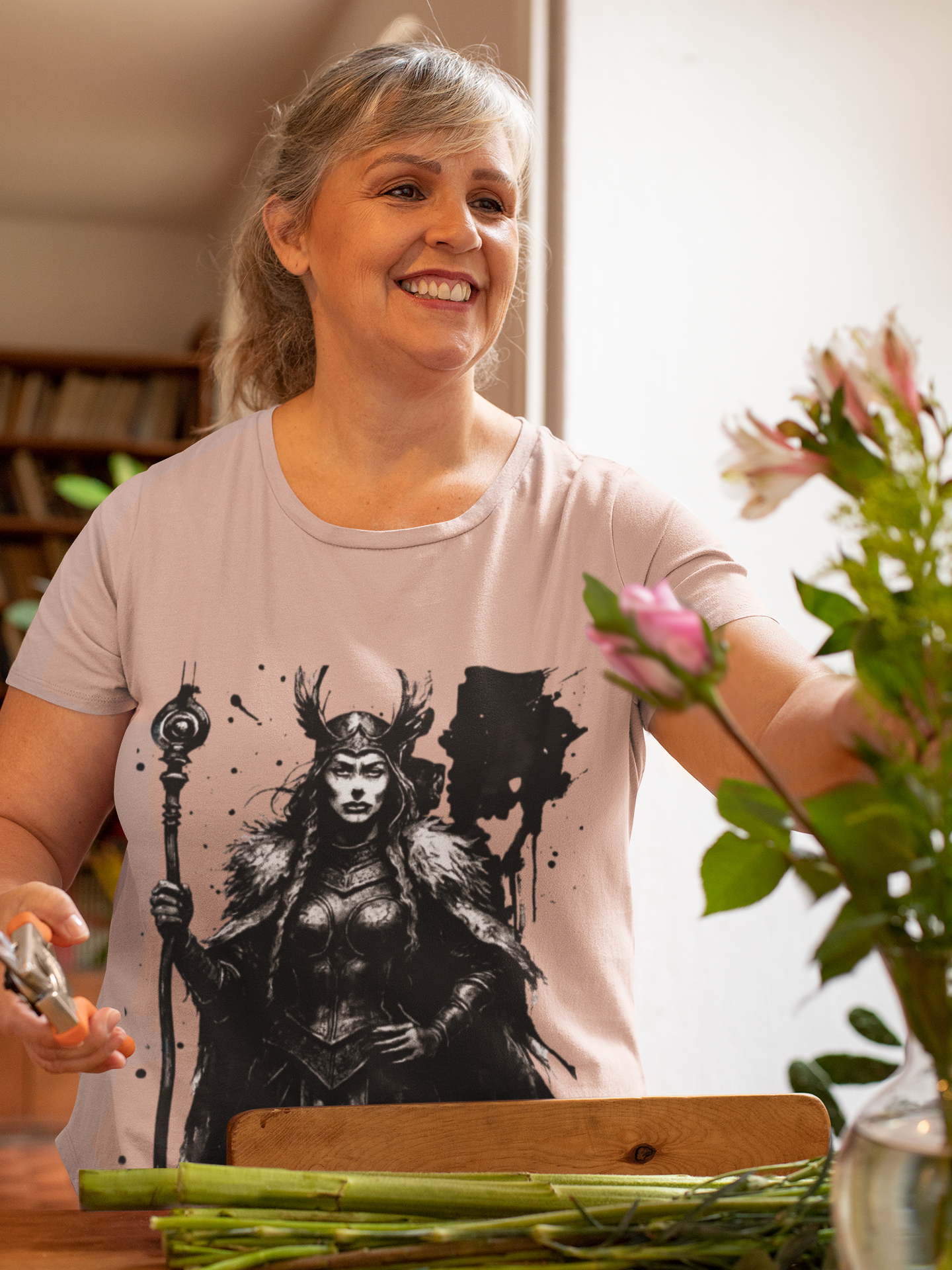 Frigg Norse Goddess T-shirt, captures the essence of Frigg, the revered Norse goddess, renowned in Nordic mythology as the embodiment of foresight and wisdom.