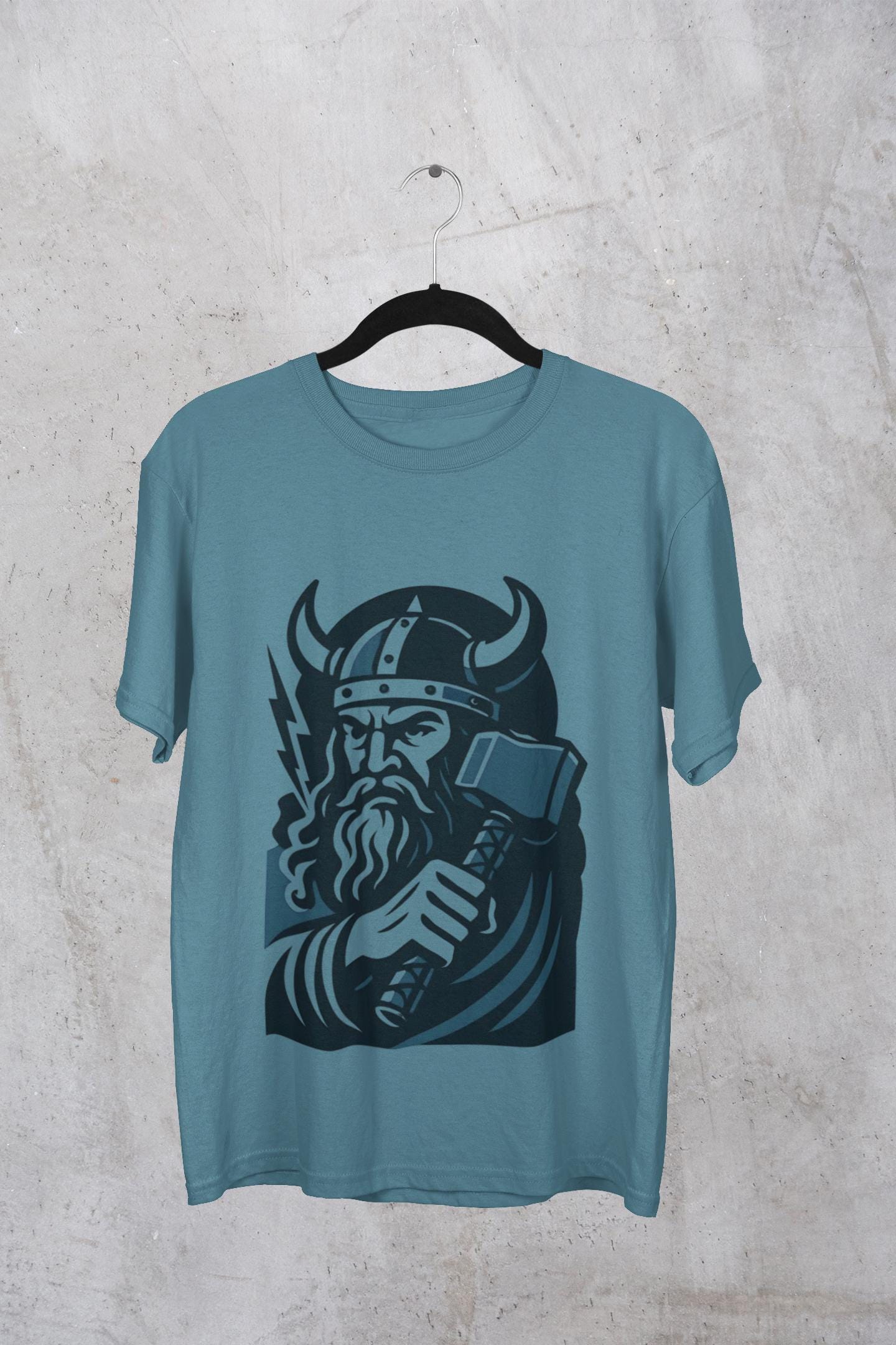 Thor Norse God Tee, Immerse yourself in the mystique of Norse mythology with our Thor Shirt, a tribute to the legendary god of thunder himself.