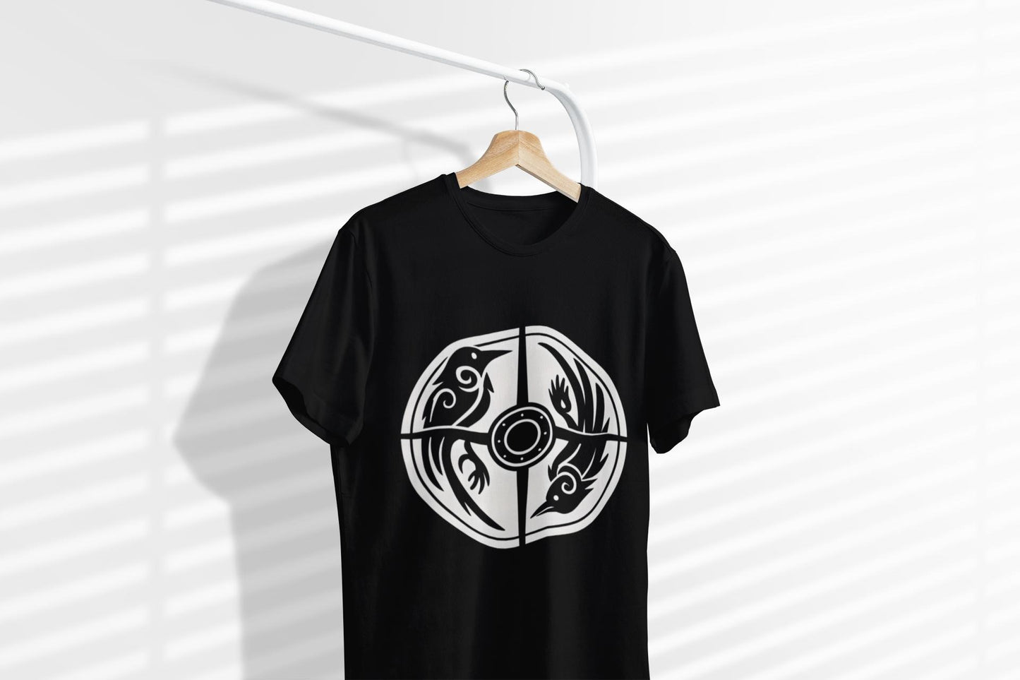 Norse Raven Shield T-shirt, Embrace the spirit of ancient warriors, an essential piece for any lover of Viking apparel.
