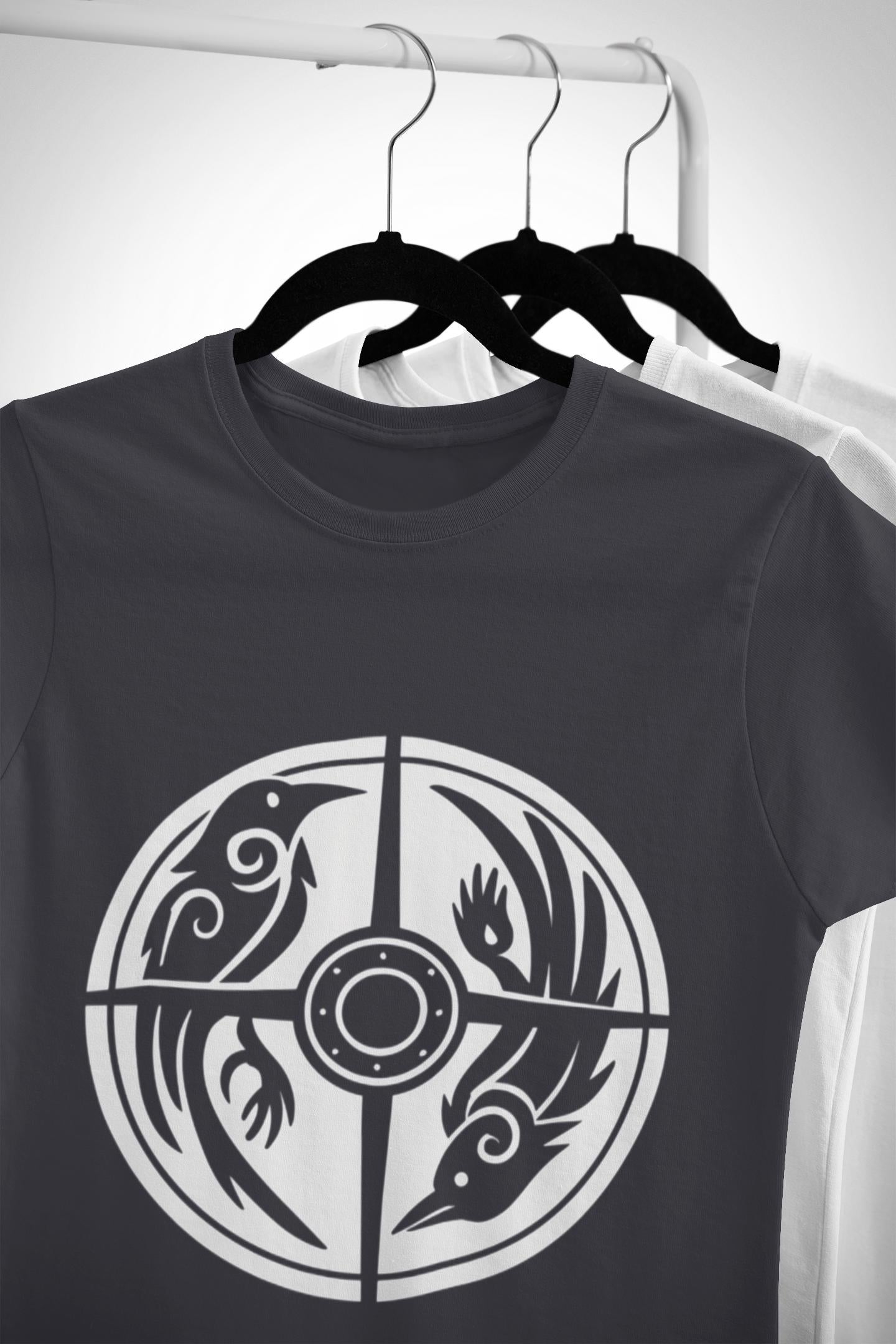 Norse Raven Shield T-shirt, Embrace the spirit of ancient warriors, an essential piece for any lover of Viking apparel.