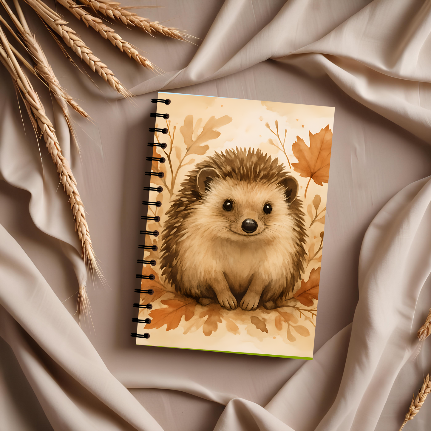 Autumn Hedgehog Notebook, This cute notebook spiral features delightful hedgehog image amidst an autumnal backdrop, capturing the heartwarming essence of a woodland creature.