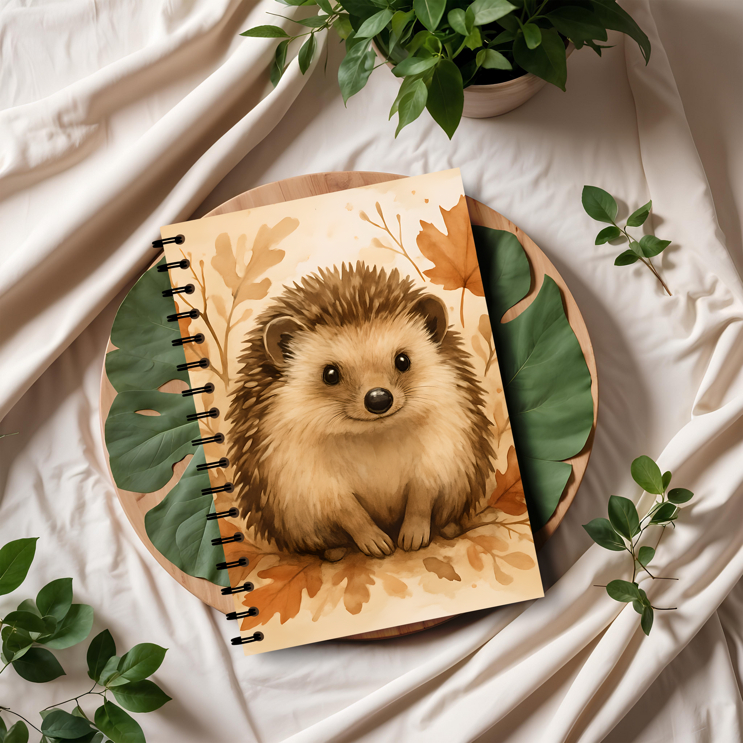 Autumn Hedgehog Notebook, This cute notebook spiral features delightful hedgehog image amidst an autumnal backdrop, capturing the heartwarming essence of a woodland creature.