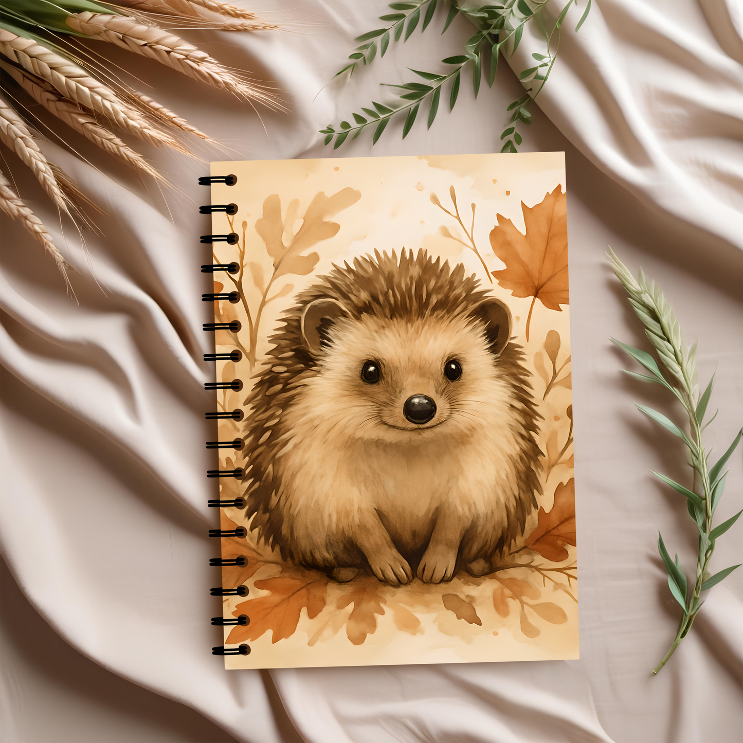 Autumn Hedgehog Notebook, This cute notebook spiral features delightful hedgehog image amidst an autumnal backdrop, capturing the heartwarming essence of a woodland creature.