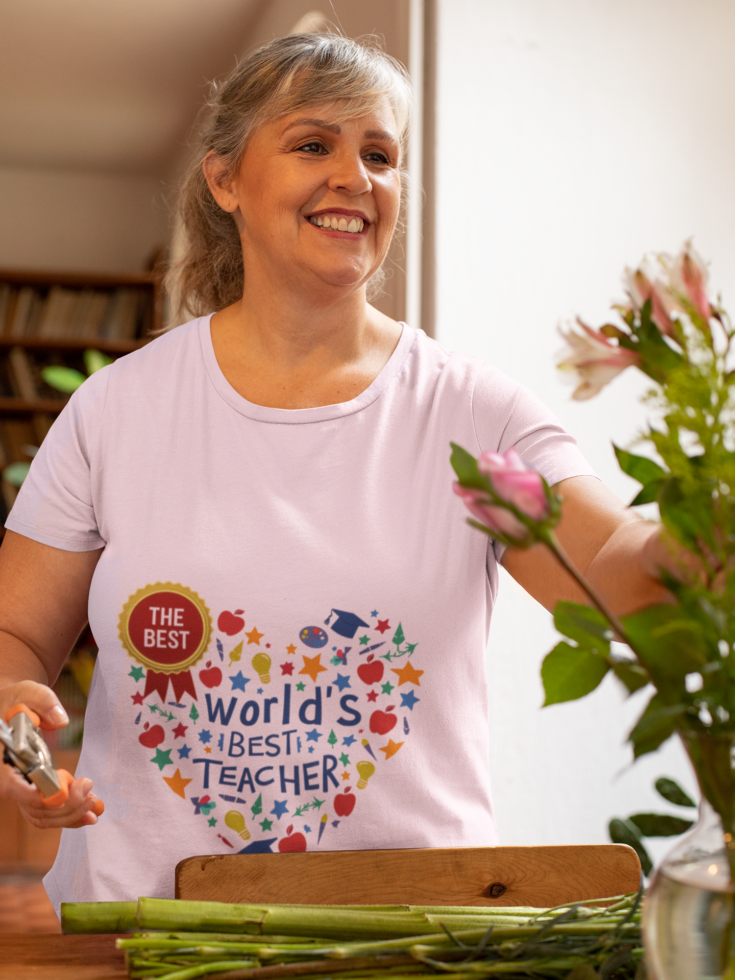 World's Best Teacher Cotton Tee - Designed to celebrate educators, this tee radiates warmth and positivity, making it a perfect gift for Teacher Appreciation Week.