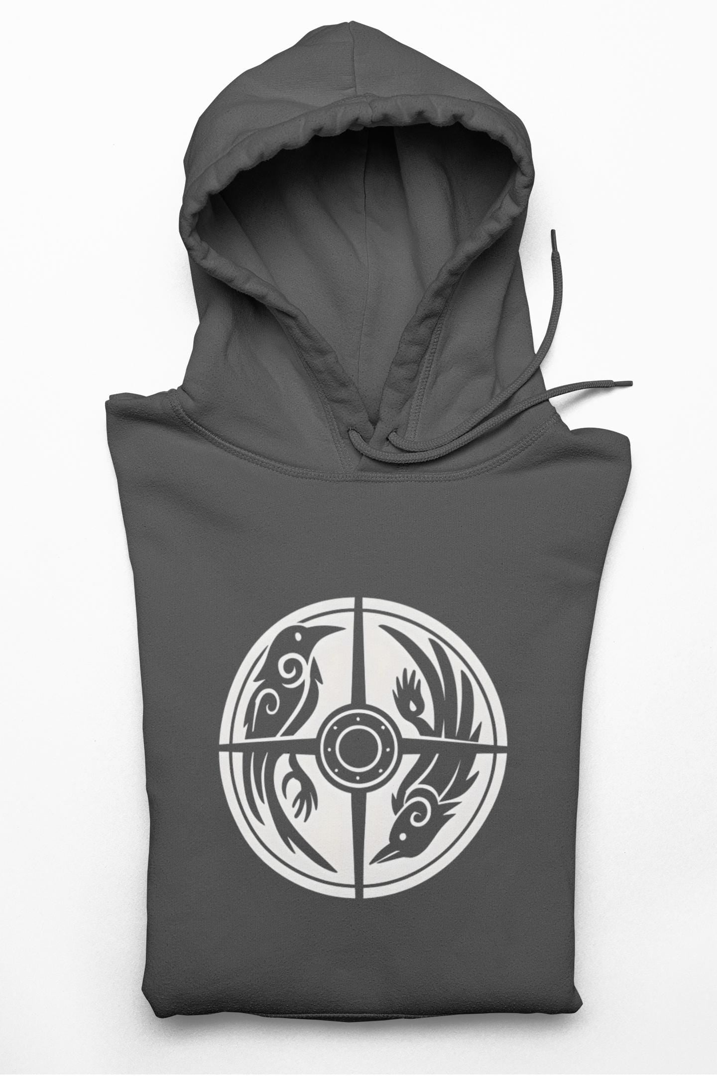 Norse Viking Shield Hoodie, Step into the realm of ancient warriors with our Norse Viking Shield Hoodie, a pinnacle of Norse design and craftsmanship.