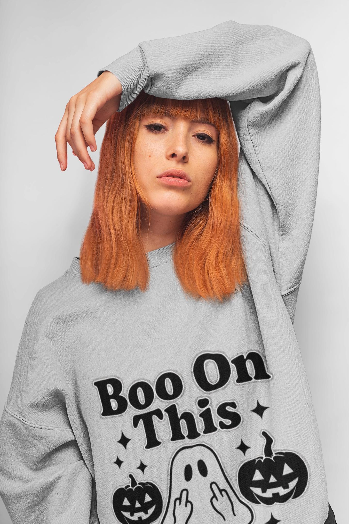 Boo on This Ghosty Sweatshirt, Step into the spirit of the season with our 'Boo on this, Ghosty Sweatshirt', a whimsical blend of warmth and ghost humor.