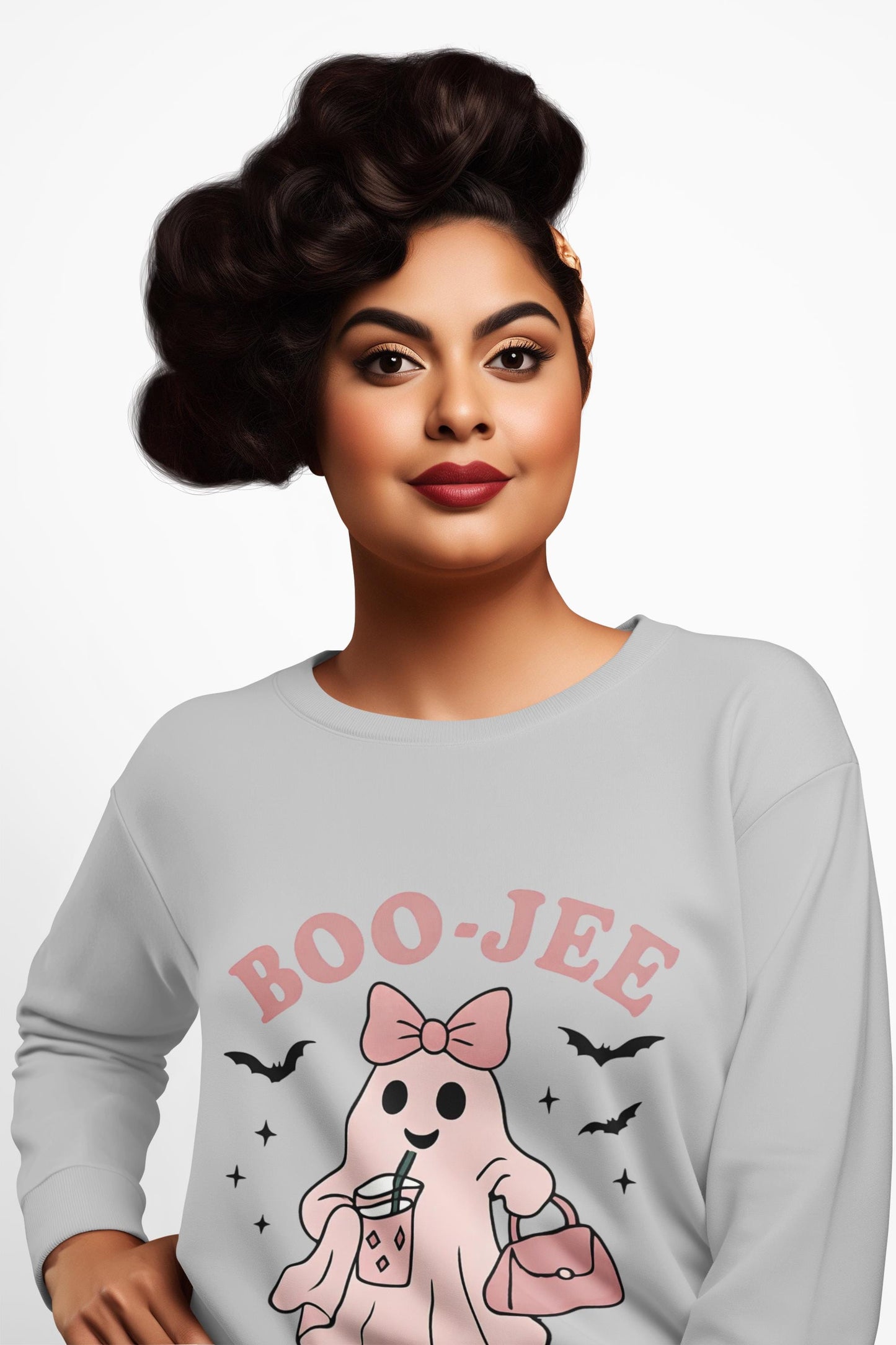 Boo-Jee Ghost Sweatshirt This playful garment, affectionately known as the boojee sweater, showcases charming ghosties adorned with a delightful pink bow.