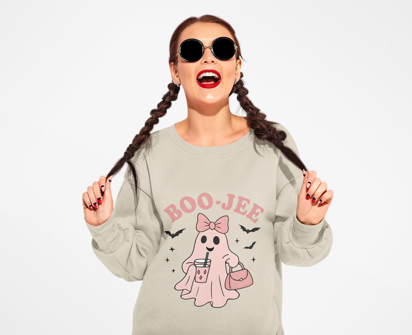 Boo-Jee Ghost Sweatshirt This playful garment, affectionately known as the boojee sweater, showcases charming ghosties adorned with a delightful pink bow.