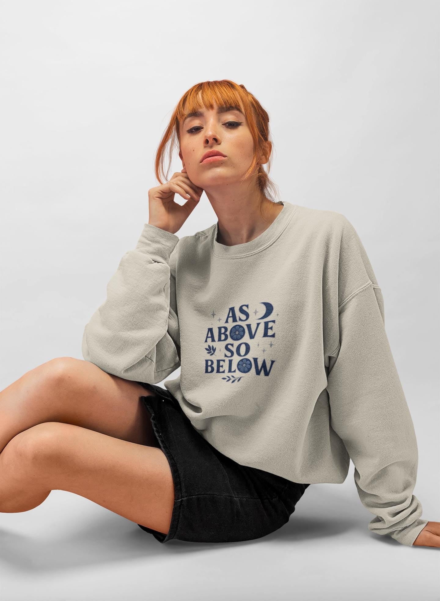 As Above So Below Sweatshirt, This witchy sweatshirt weaves the essence of paganism into every thread, making it the perfect piece of pagan clothing for those who cherish witchy things.