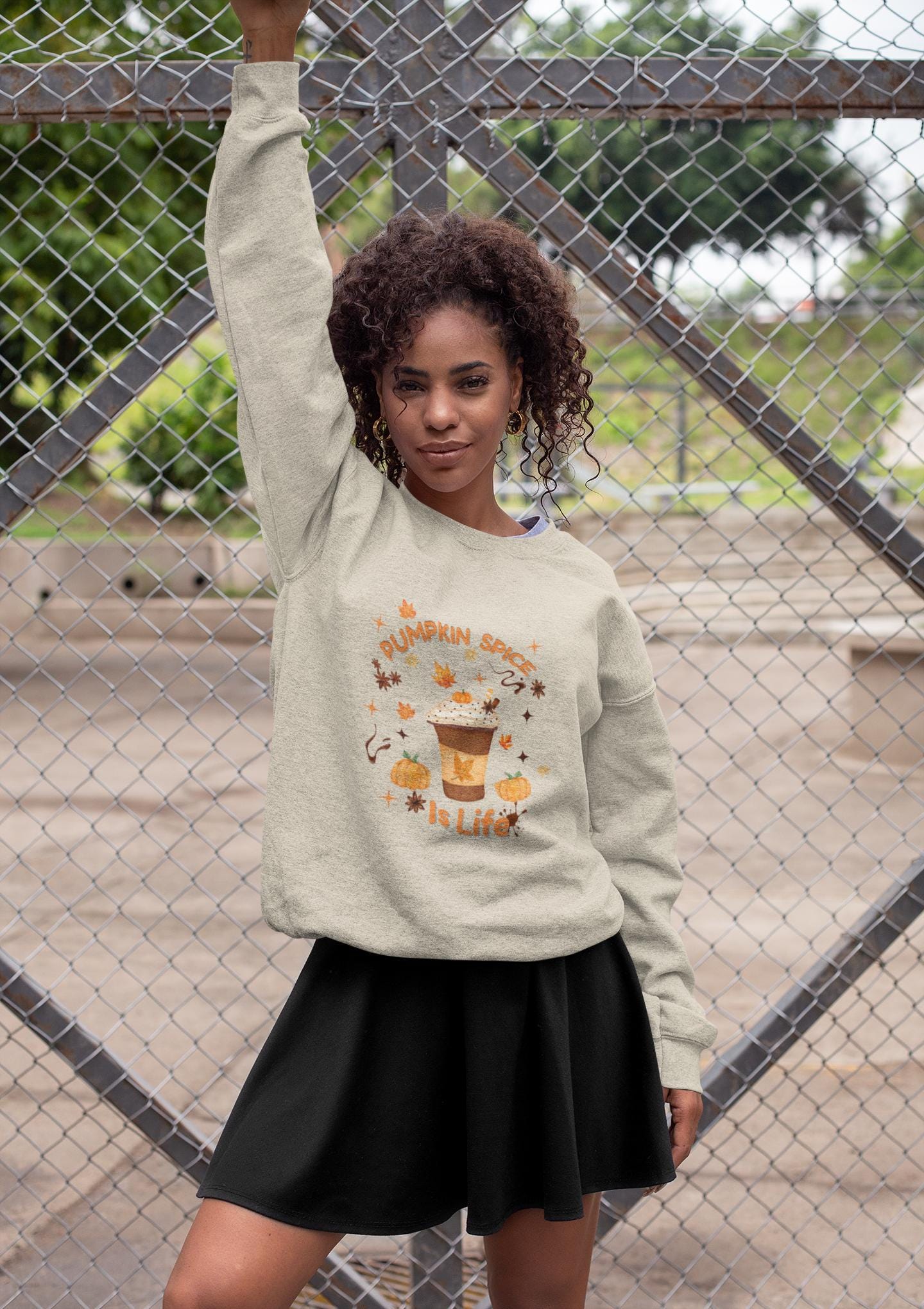 Pumpkin Spice is Life Sweatshirt, This autumn jumper is designed to wrap you in the warmth and comfort that the pumpkin spice season brings.