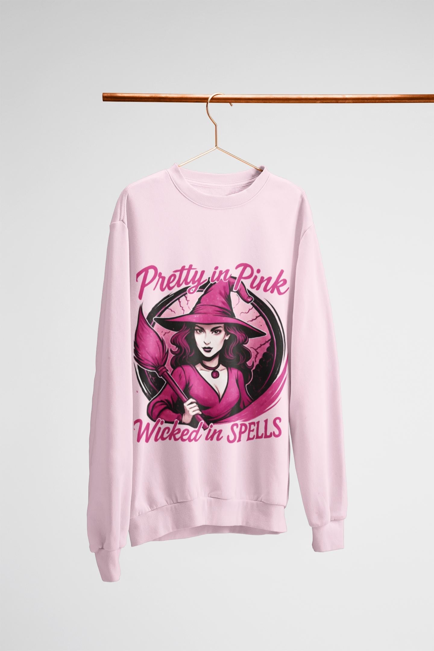 Pretty in Pink Witchy Sweatshirt, a unique twist to your girly Halloween ensemble, with a sprinkle of glitter witch vibrance.