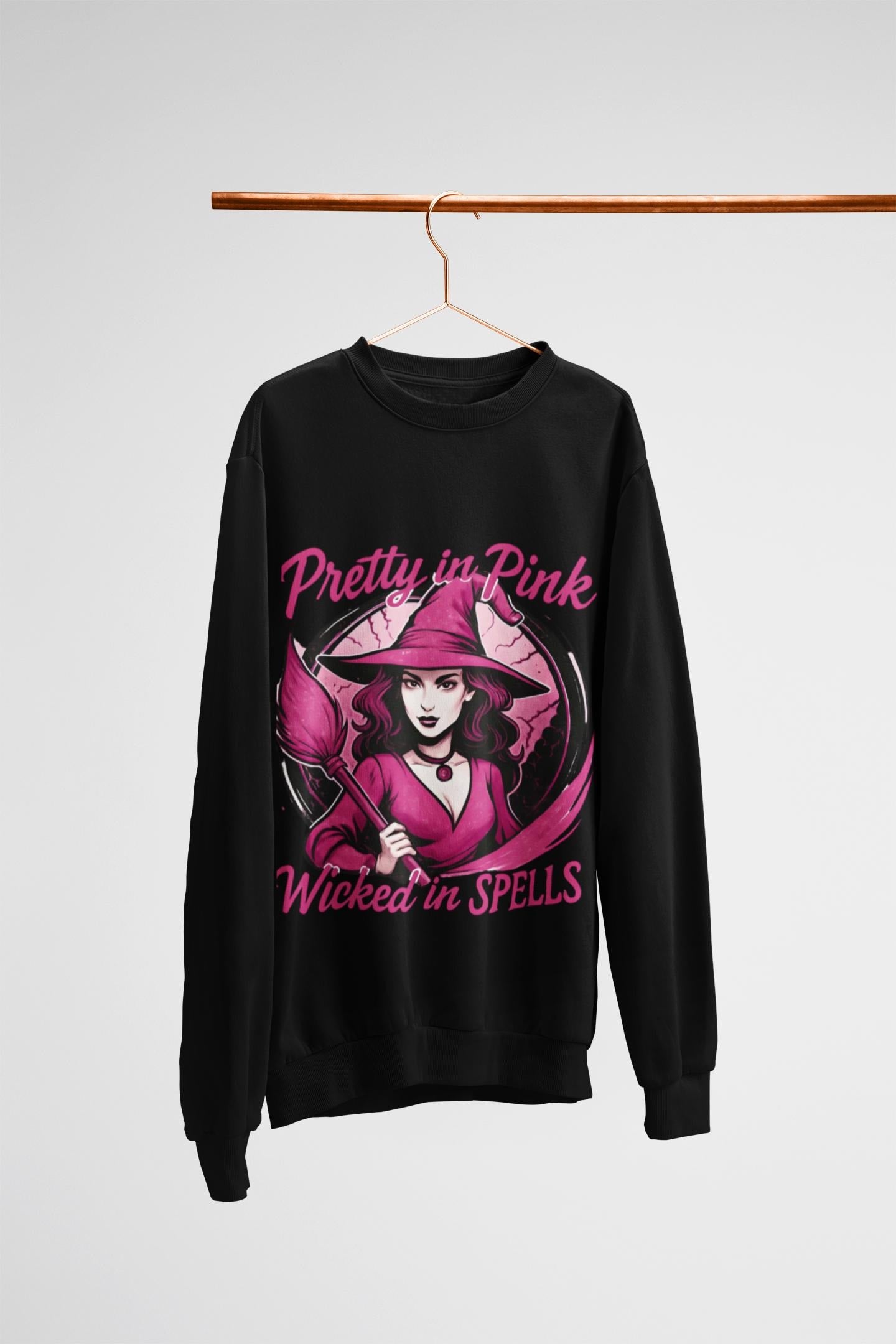 Pretty in Pink Witchy Sweatshirt, a unique twist to your girly Halloween ensemble, with a sprinkle of glitter witch vibrance.