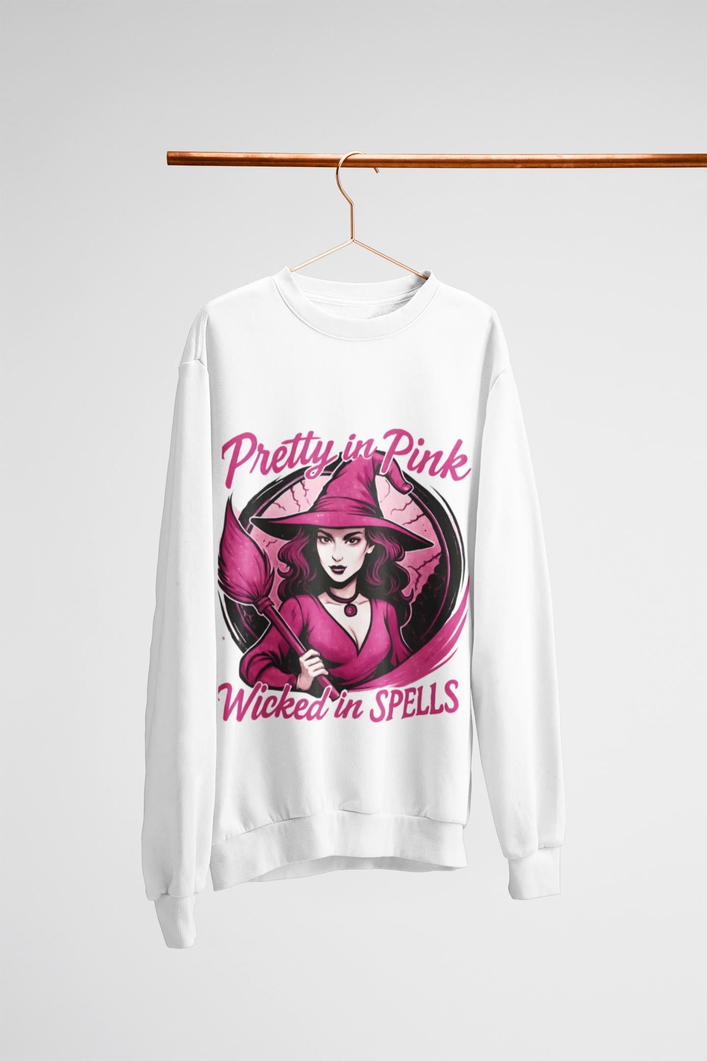 Pretty in Pink Witchy Sweatshirt, a unique twist to your girly Halloween ensemble, with a sprinkle of glitter witch vibrance.