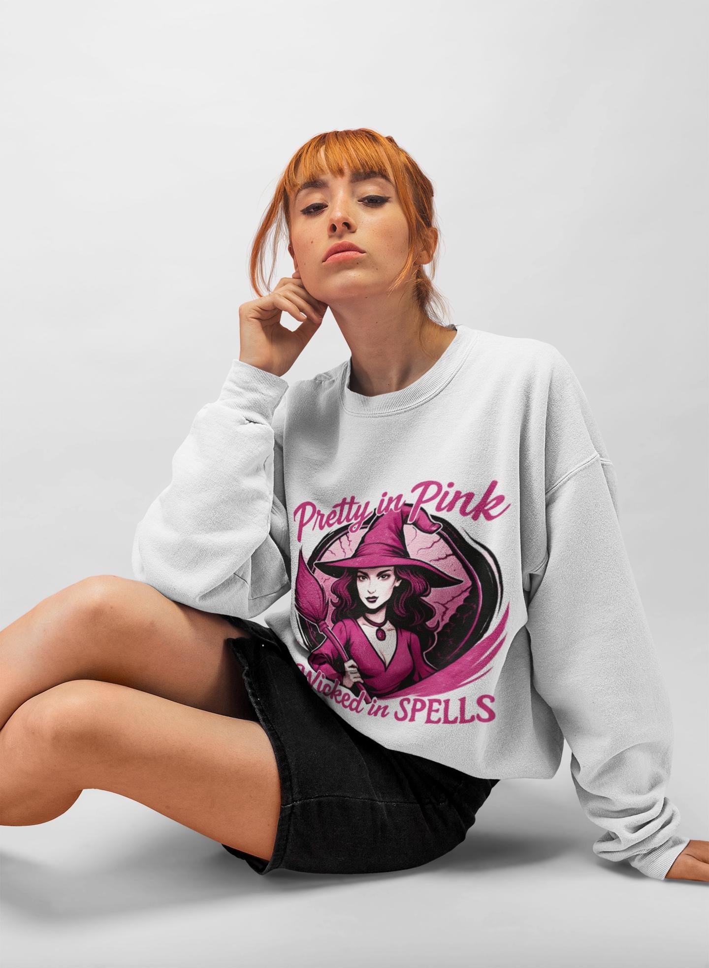 Pretty in Pink Witchy Sweatshirt, a unique twist to your girly Halloween ensemble, with a sprinkle of glitter witch vibrance.