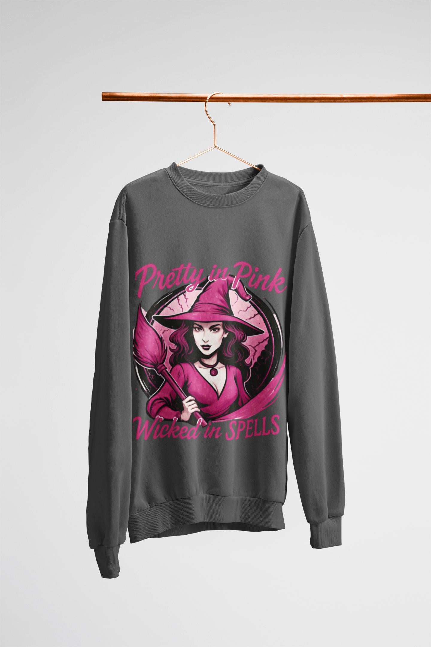 Pretty in Pink Witchy Sweatshirt, a unique twist to your girly Halloween ensemble, with a sprinkle of glitter witch vibrance.