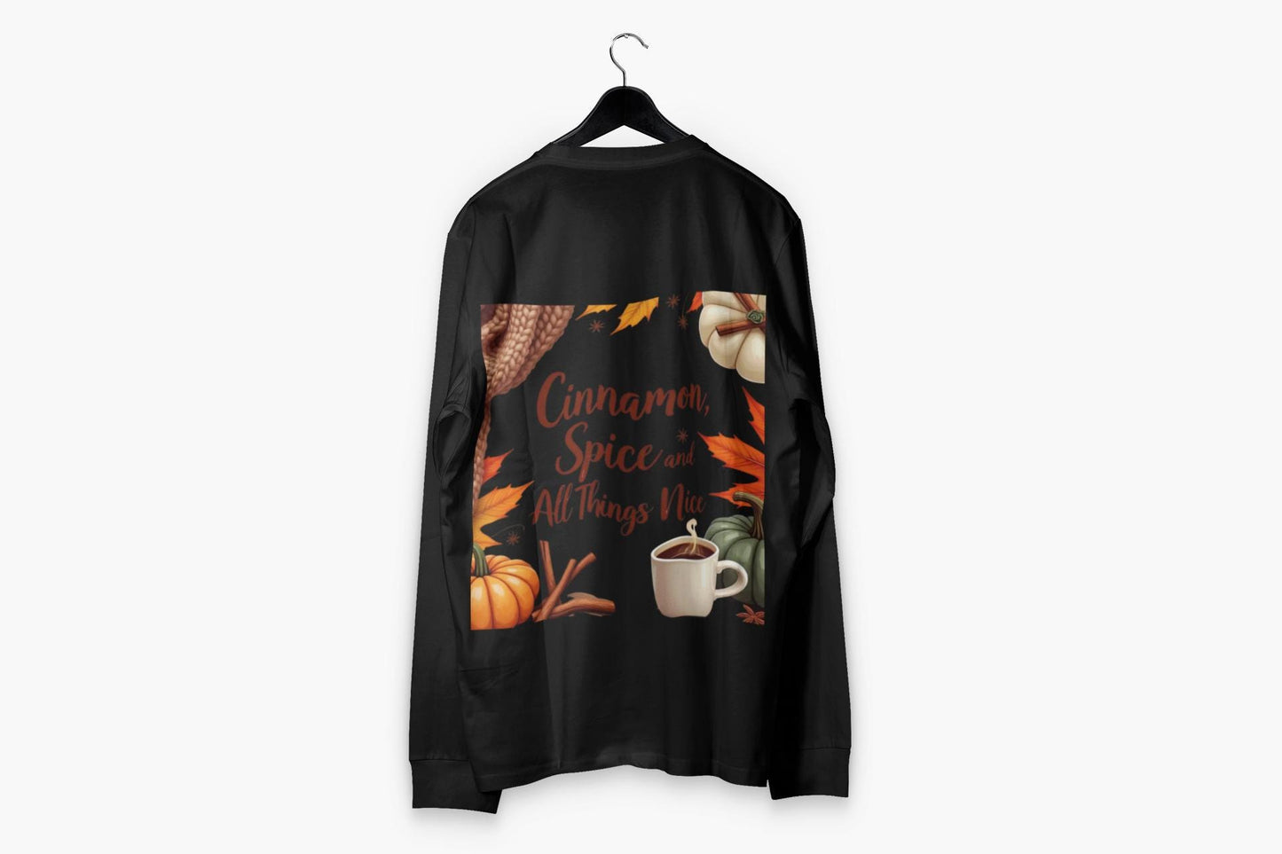 Cinnamon Spice and All Things Nice Sweatshirt, promises to keep you snug while adding a touch of seasonal charm to your wardrobe. Whether you’re sipping on a pumpkin latte or taking a leisurely stroll through fallen leaves,