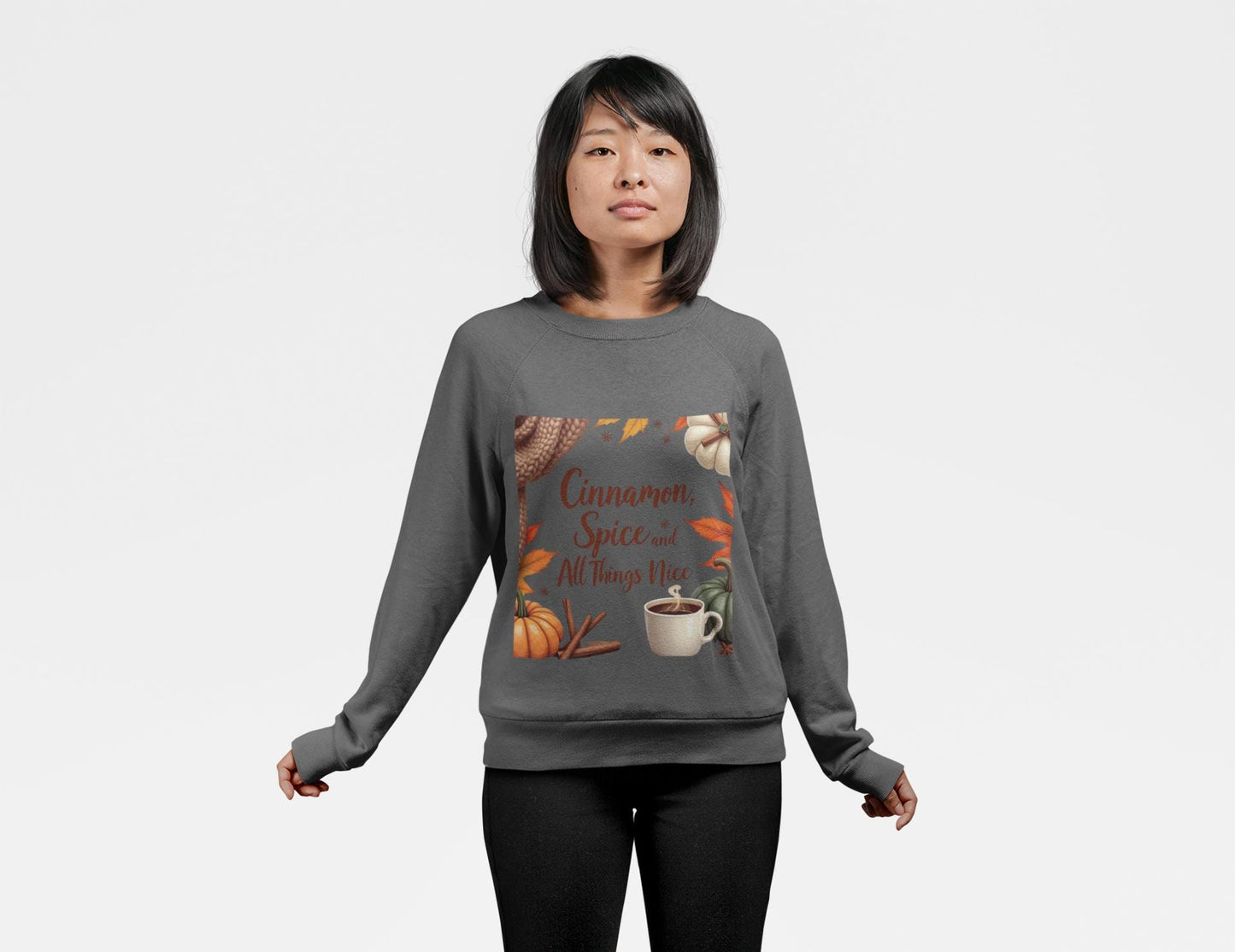 Cinnamon Spice and All Things Nice Sweatshirt, promises to keep you snug while adding a touch of seasonal charm to your wardrobe. Whether you’re sipping on a pumpkin latte or taking a leisurely stroll through fallen leaves,