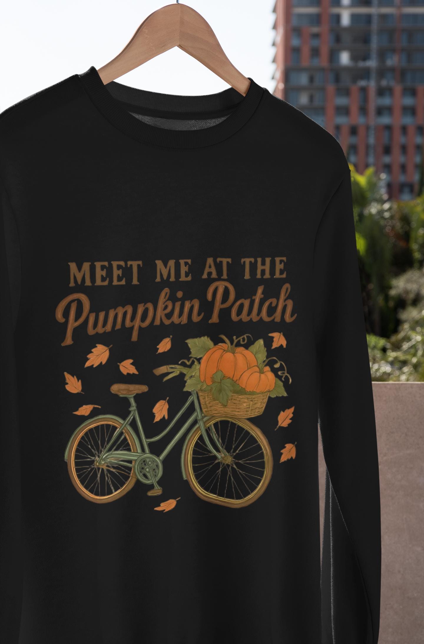 Meet me at the pumpkin patch Sweatshirt, This autumnal jumper wraps you in warmth, making chilly days inviting and every outing a celebration of the season.