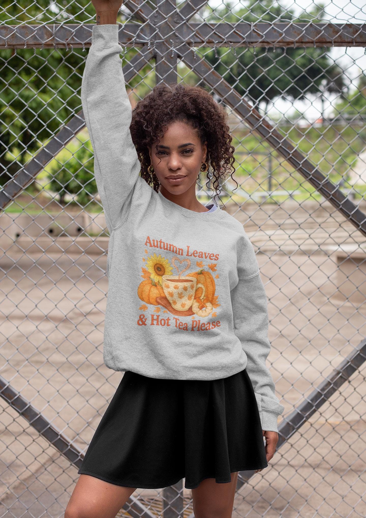 Autumnal Leaves and a Cup of Tea Sweatshirt, Imagine sipping on a warm cuppa, perhaps a delightful Yorkshire tea in a comfortable sweater.