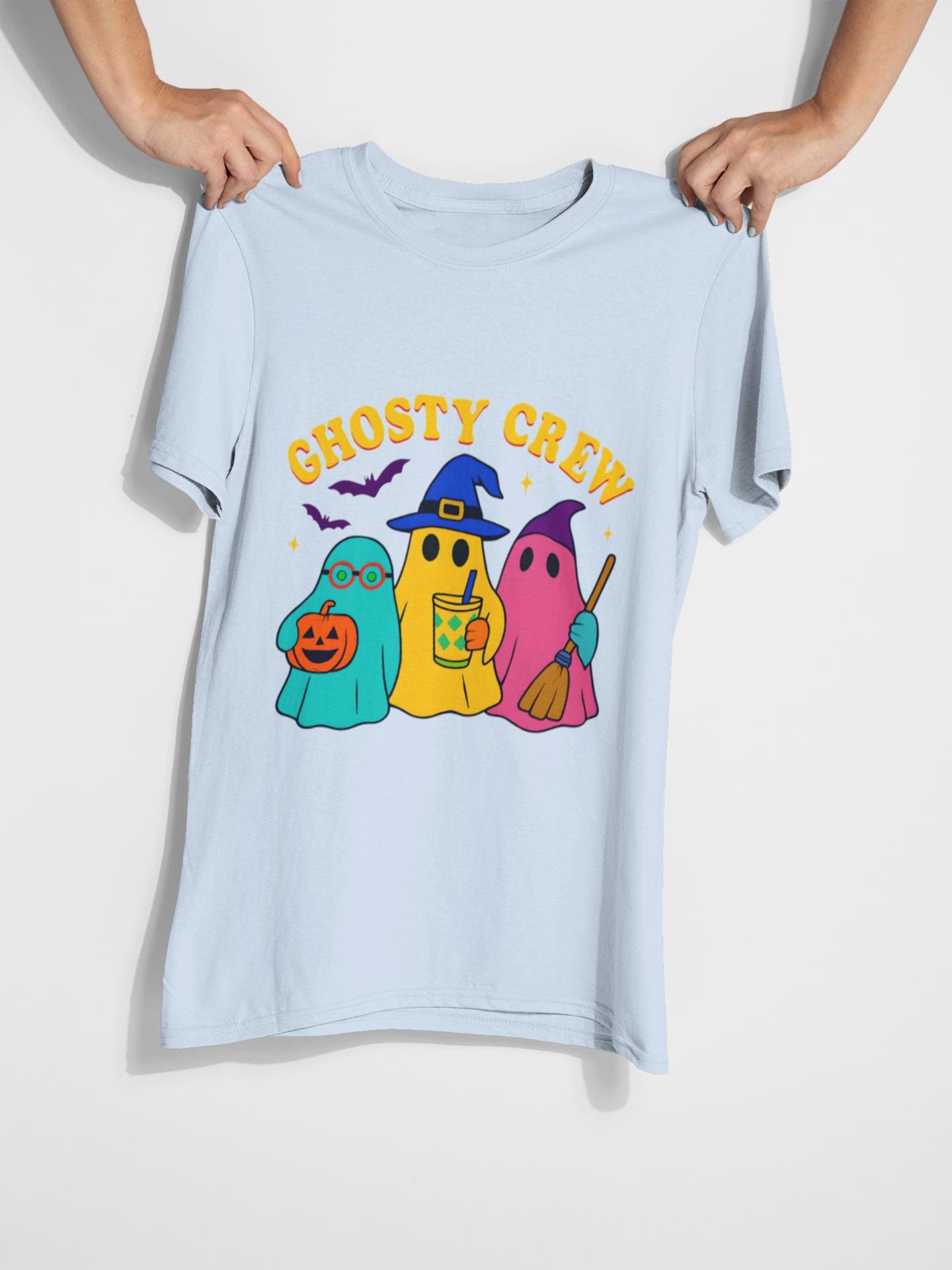 Ghostly Crew Tee, This tee is ideal for individuals who love to share in the holiday spirit, making it a wonderful gift for friends, family, or even yourself.