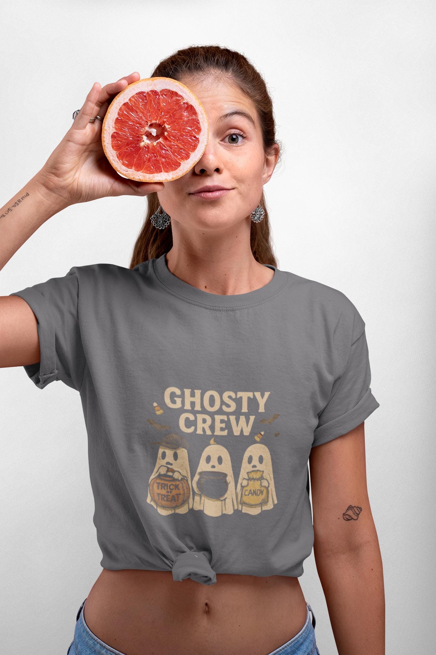 Halloween Ghosty Tee - Women's Softstyle Shirt Perfect for those who love Halloween and want to add a touch of spookiness to their wardrobe.