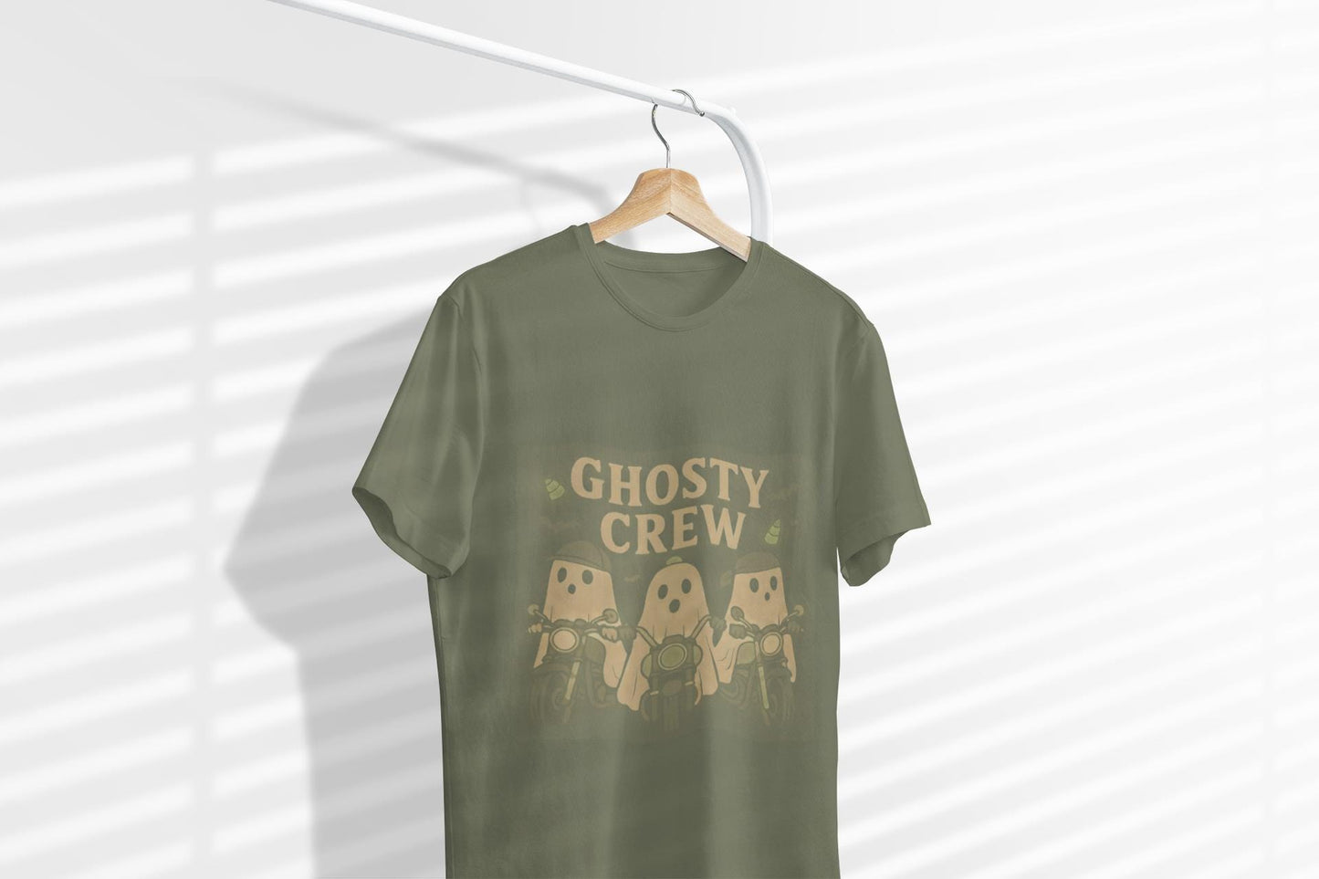 Halloween Ghosty Tee Ghost biker tee, perfect for showing off your fun and playful spirit! This tee boasts a vibrant design featuring ghostly charactersriding bikes.