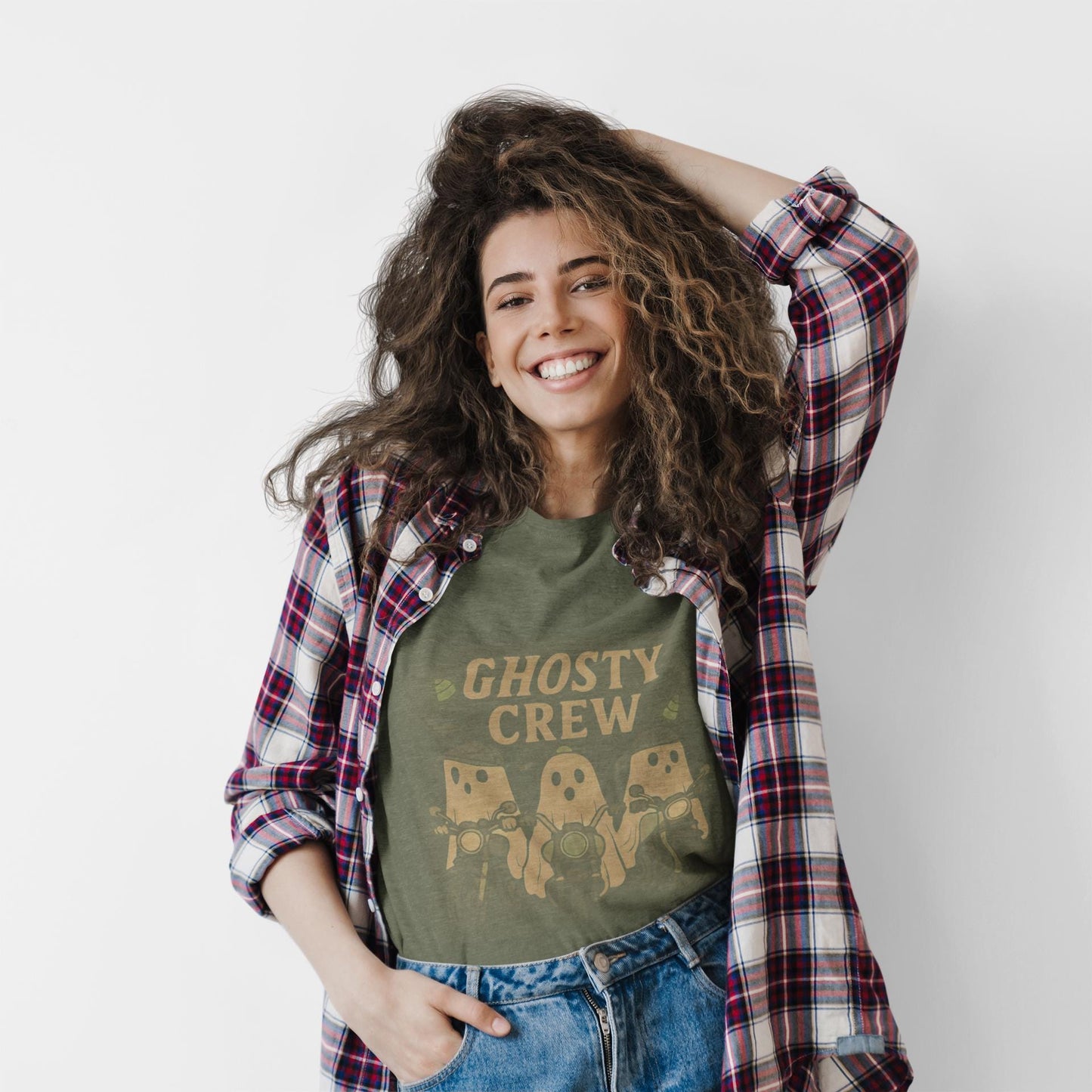 Halloween Ghosty Tee Ghost biker tee, perfect for showing off your fun and playful spirit! This tee boasts a vibrant design featuring ghostly charactersriding bikes.