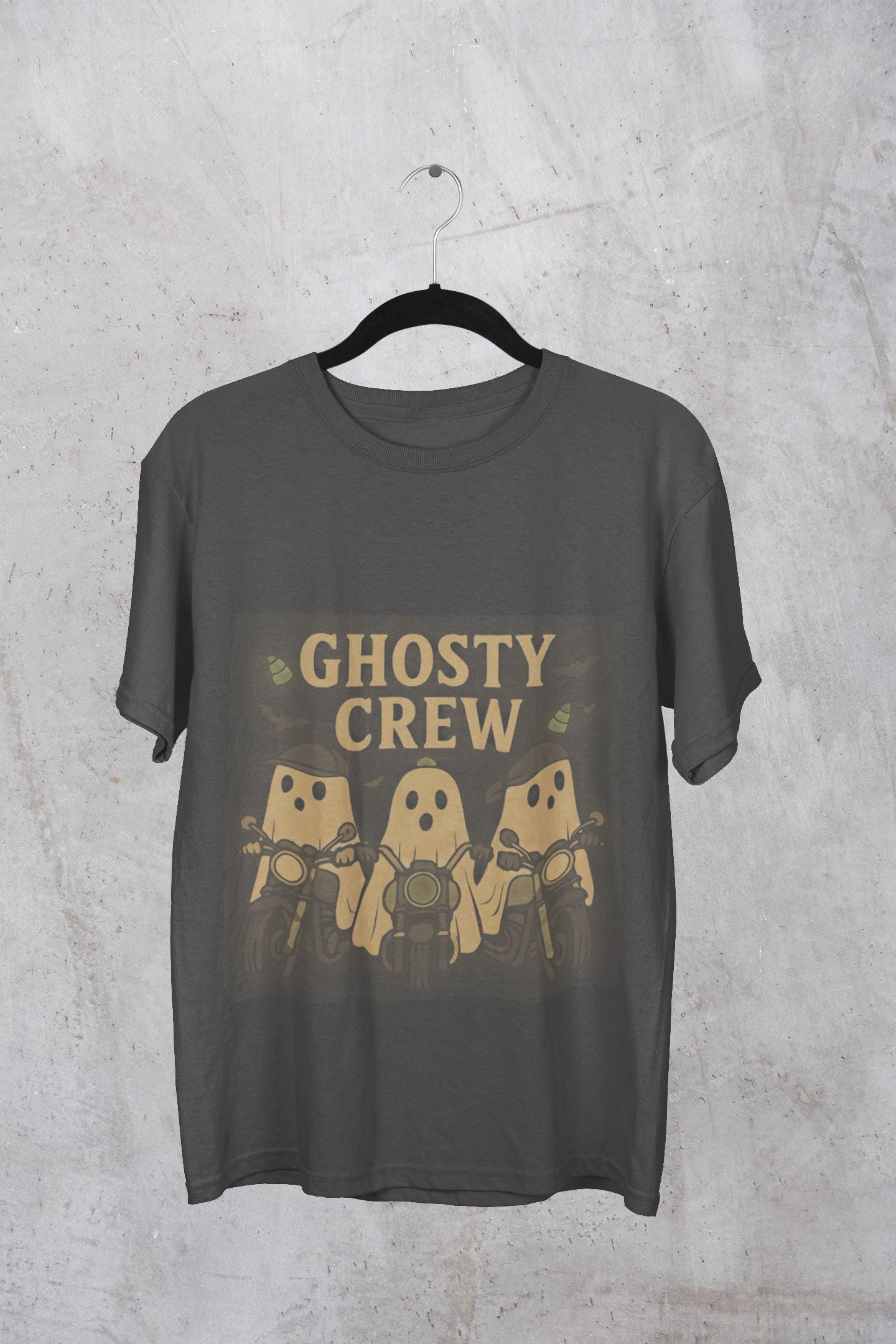 Halloween Ghosty Tee Ghost biker tee, perfect for showing off your fun and playful spirit! This tee boasts a vibrant design featuring ghostly charactersriding bikes.