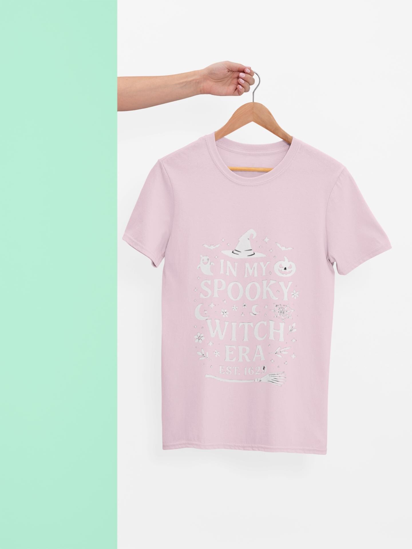 In My Spooky Witch Era Tee, Salem Witch Shirt, a bewitching homage to Salem's mystical past. Imbued with the spirit of the legendary Salem witches.