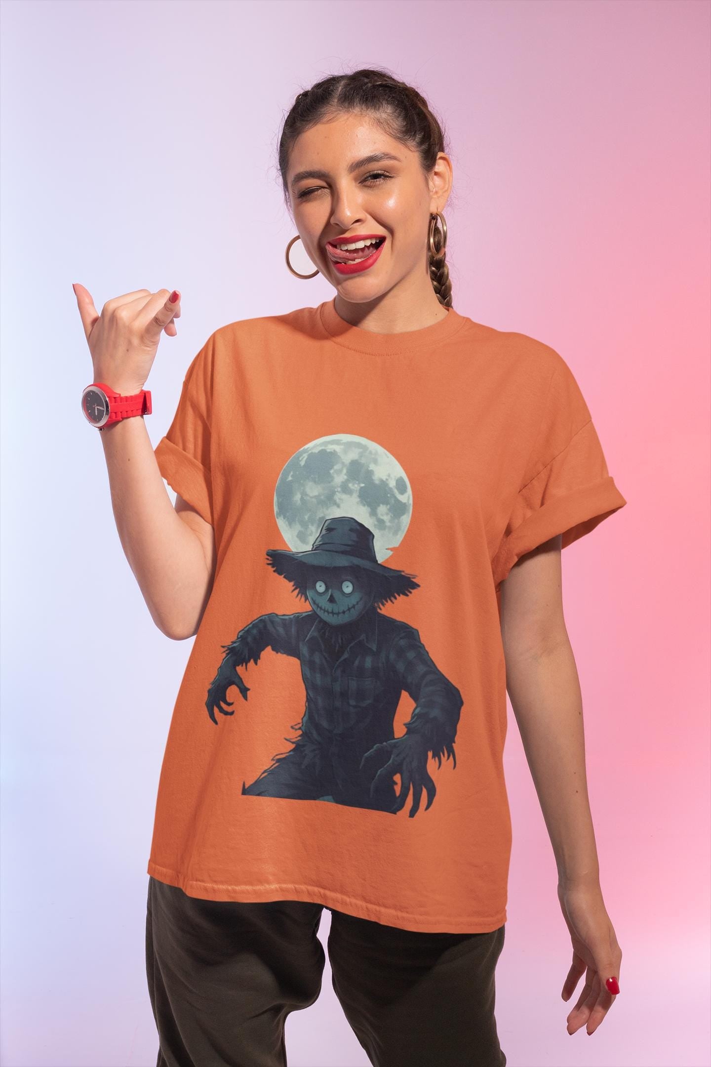 Halloween Scarecrow T-Shirt, This scarecrow shirt captures the essence of the season, transforming the traditional harvest icon into a pumpkin scarecrow that’s both captivating and chilling.Halloween