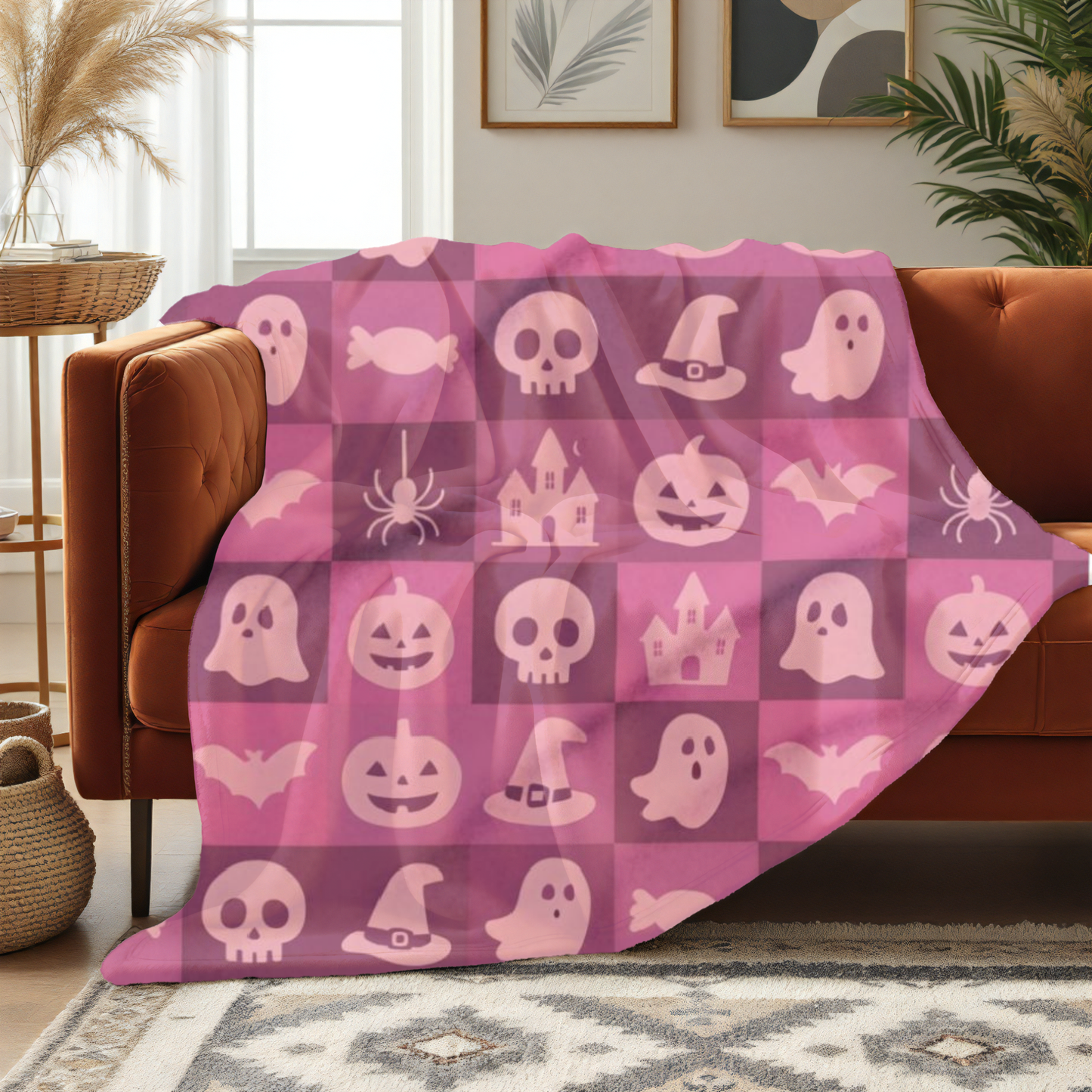Spooky Pink Halloween Blanket, perfect for adding a unique twist to your seasonal decor. Drape this plush pink ghost blanket over your sofa to invite a cozy, festive warmth