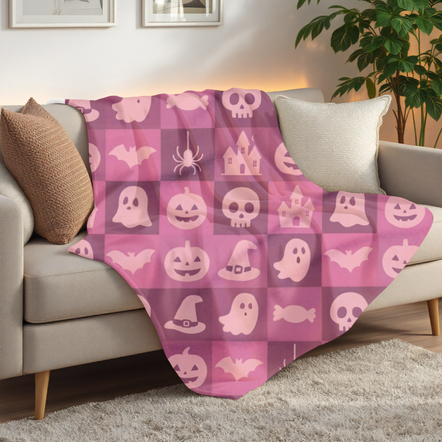 Spooky Pink Halloween Blanket, perfect for adding a unique twist to your seasonal decor. Drape this plush pink ghost blanket over your sofa to invite a cozy, festive warmth